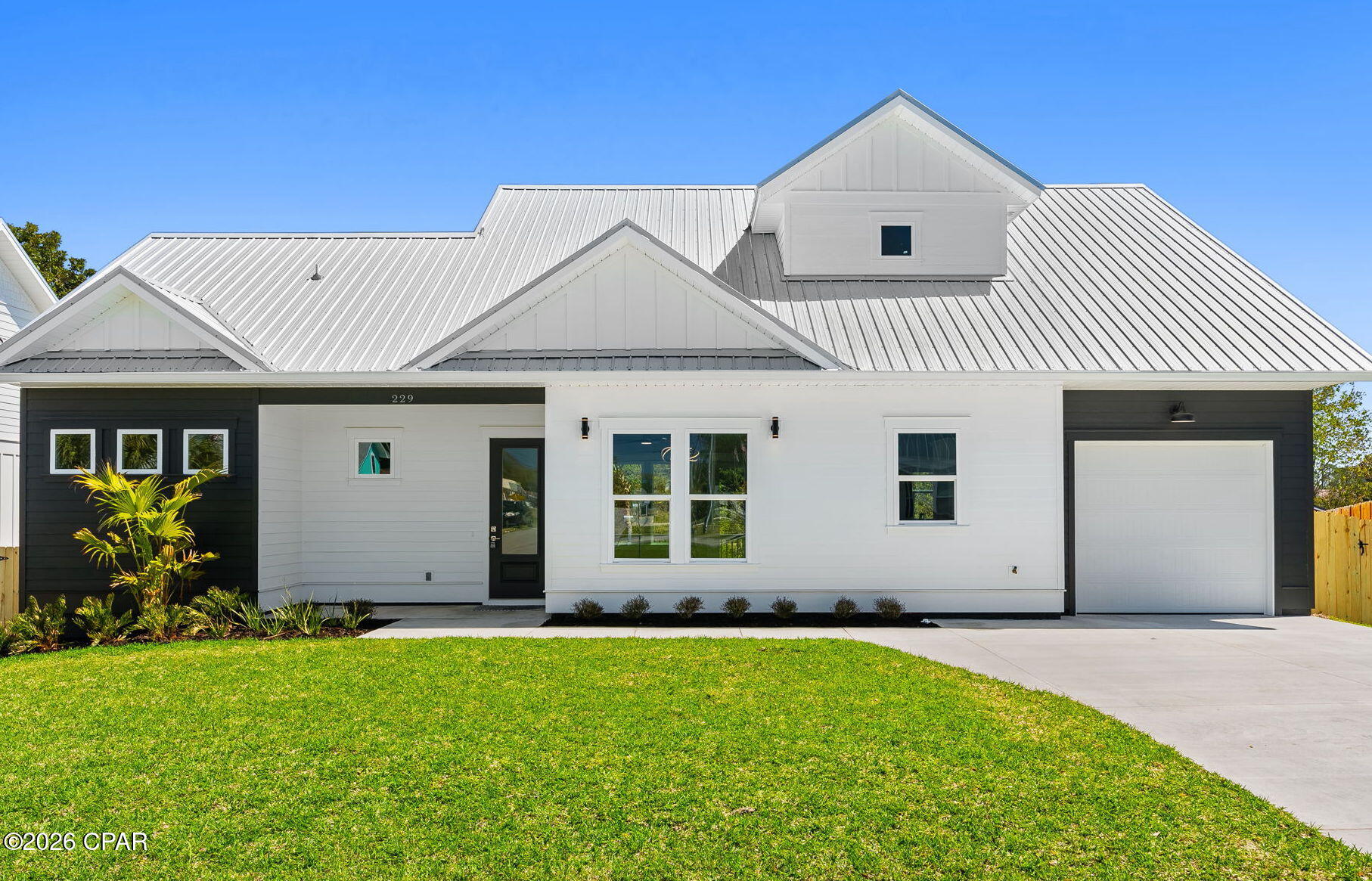 Waterfront Luxury on Lullwater Lake - Brand New Home with up to $10,000 in Seller Closing Cost Assistance or Rate Buy-Down! 
Imagine waking up to serene lakefront living in this stunning, brand-new two-story home at 227 Lullwater Drive in beautiful Panama City Beach. This 1,817 sq ft masterpiece features 3 spacious bedrooms, 2.5 designer baths, and a luxurious main-level primary suite.
Built with quality features including hurricane-impact windows & doors, spray-foam roof deck insulation, Taexx in-wall pest control, reclaimed-water irrigation, gutters, wrap-around fencing, and an oversized 1-car garage.
Enjoy true freedom with NO HOA fees and no flood zone. You're within walking distance to the beach, minutes from Pier Park, and close to Frank Brown Park's recreation facilities.
This fresh listing comes with a 1-year builder warranty and transferable termite bond. Perfect as a primary residence, second home, or long-term investment. Schedule your private tour today and claim your slice of paradise!