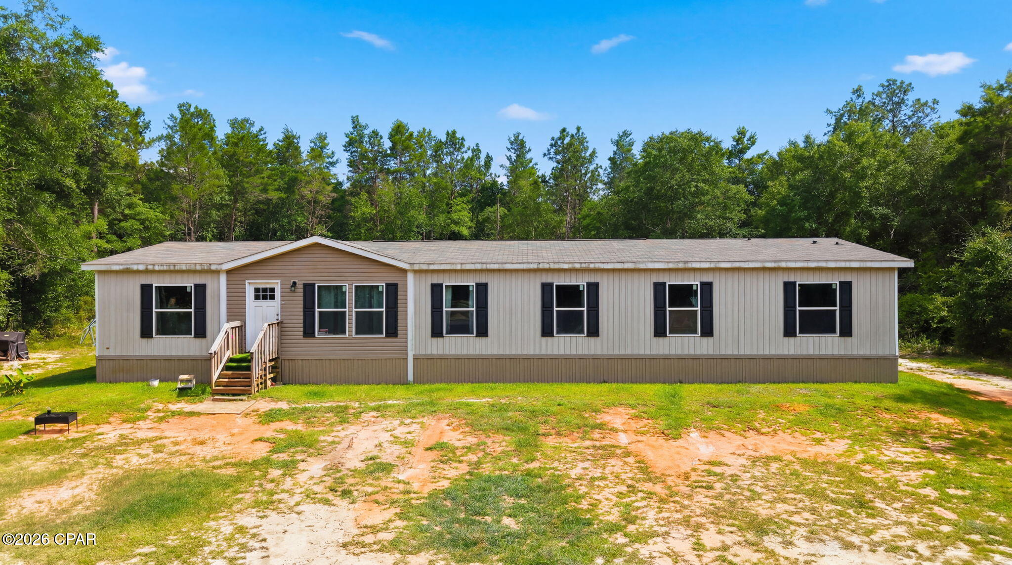 Welcome to 11437 Floridale Drive, where privacy, freedom, and peace of mind come together to create the lifestyle many buyers are searching for but rarely find. Built in 2023, this 5-bedroom, 3-bath manufactured home offers over 2,400 square feet of open concept living. Inside, newer appliances complement a well designed floor plan featuring multiple gathering areas, allowing everyone to enjoy their own space while still providing inviting places to connect. Step outside and the possibilities expand even further. Situated on more than 5.5 acres and zoned AG-RR, this property offers the freedom to create your own version of country living. Because the home is only a few years old, you'll enjoy the confidence that comes with modern construction and a reduced likelihood of immediate repairs or costly updates. Rather than spending your time tackling projects, you can focus on settling in and enjoying everything this property has to offer.