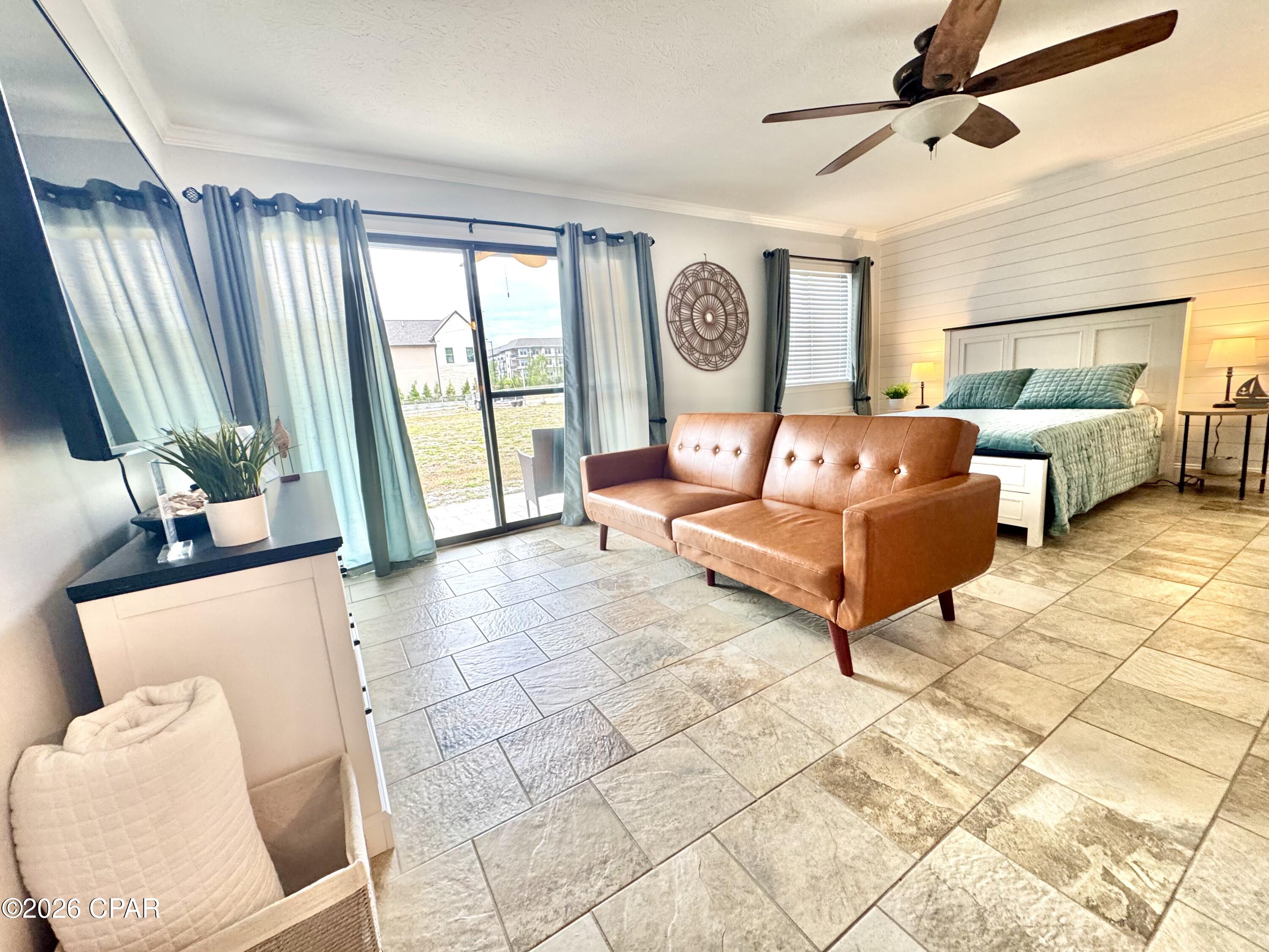 Welcome to Pirate's Cove. This quaint community offers beautiful views of Lake Powell where you can enjoy a day of jet skiing, kayaking and paddleboarding all the way to the gulf. There is also a pier for a day of fishing, a  boat launch and two community pools, one of which is directly off of the patio and the other overlooks the lake. This cozy, first floor studio unit comes fully furnished and will be perfect for a rental or to call home. At Pirate's Cove, you are just a short commute to the beach, Camp Helen State Park and great shopping, dining and attractions that 30A and Panama City Beach offer. Don't miss out on this opportunity to own an affordable piece of paradise. Buyer to verify all information deemed important.