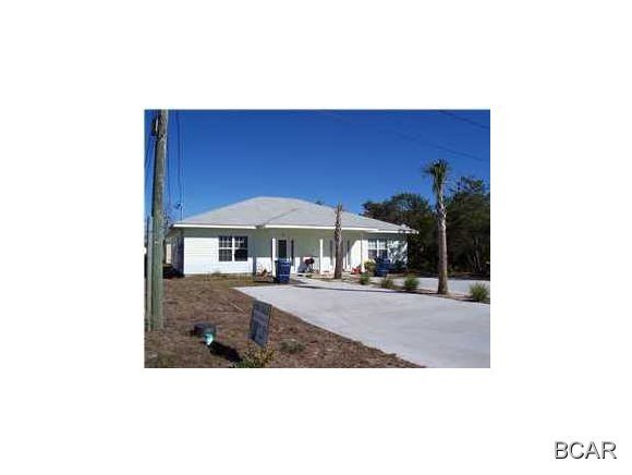 Very nice home only 3 blocks from the beach with ceramic tile throughout, washer and dryer, breakfast bar, raised ceilings, and fenced back yard.  Close to schools and Pier Park.