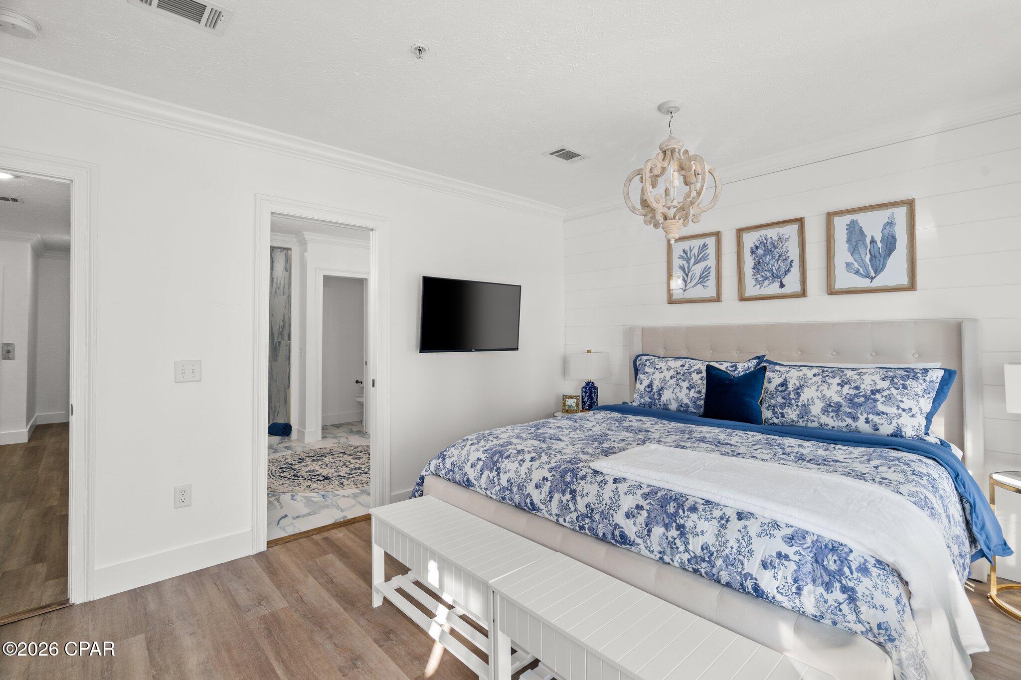 Welcome to your GORGEOUS coastal beach retreat! 

This elegant townhome known as The Hampton is just a 4-minute walk to the white sandy beaches. Perfect as an investment property, a primary residence, or a vacation/second home, this luxurious, fully furnished, 5 bedroom, 4.5 bath sleeps up to 14 guests in high style and cozy comfort. And its location so close to the turquoise Gulf of Mexico means you'll wake up to sea breezes, ocean views, and unforgettable sunsets -- without ever leaving your front door.

HIGHLIGHTS INCLUDE:
• Nautical, Hamptons-style design with elegant finishes
• Multiple private balconies with ocean breezes and sunset Gulf views
• Gourmet kitchen, fully equipped with all the essentials
• Spacious open-concept living with 10 ft ceilings 
• Easy access to a sparkling community pool
----------
LIVING SPACES:
--Gourmet Kitchen: White granite, cobalt cabinetry, farmhouse sink, bronze fixtures, and seating for four at the island.
--Dining Nook: Bench seating for five with views of palms, sunsets, and the ocean through floor-to-ceiling windows.
--Living Room: Indigo sectional, natural-linen armchair, Smart TV, and airy coastal tones create the perfect spot to relax together.
----------
BEDROOMS AND BATHS:
--Master Suite (3rd floor): King bed, private balcony with sea views, spa-like ensuite with soaking tub & custom walk-in shower.
--Guest Suites: Two Queen bedrooms, each with ensuite baths and elegant Hamptons décor.
--Family Bunk Rooms: Two bedrooms with twin bunks (4 beds each), perfect for kids or teens. Shared full bathroom with mosaic tile.
--Bathrooms: 4.5 total, all featuring white granite, cobalt blue cabinetry, and bronze fixtures.
----------
OUTDOOR FEATURES:
--Private Balconies: Doors open to multiple balconies with Gulf breezes and vibrant sunsets.
--Community Pool: Perfect for cooling off after a day at the beach.
--Private garage for parking, a fun game-room conversion, or room to store your pool toys and beach equipment.

Thank you for your interest!  

Ask your Realtor for the Airbnb link, and be sure to view the walkthrough video attached to this listing.  

We look forward to your offer!