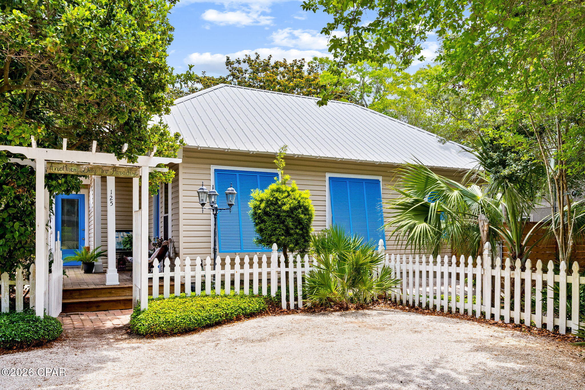Beautifully designed and built to reflect true island-style living, this meticulously maintained home offers a rare opportunity priced under market value for a quick sale at $625,000. Featuring 10-foot ceilings, 9-foot doors, and transom windows above every doorway, the home feels bright, open, and full of character. The flexible layout includes two full kitchens and a separate entrance mother-in-law suite divided by the laundry room, making it ideal for multi-generational living or rental potential. The primary suite in the main home features a spacious walk-in closet, a large jacuzzi tub, and a separate walk-in shower with a floor-to-ceiling window that fills the space with natural light. Recent upgrades include new hurricane-impact windows, hurricane shutters, a 30-year roof, new Trex decking, and new custom Hurricane shutters. The property is fully enclosed with a brand-new fence and offers separate backyard spaces, all surrounded by lush, thoughtfully designed landscaping that creates a private, garden-like setting. This unique home blends charm, functionality, and value--and is expected to sell quickly. Call for more info.
