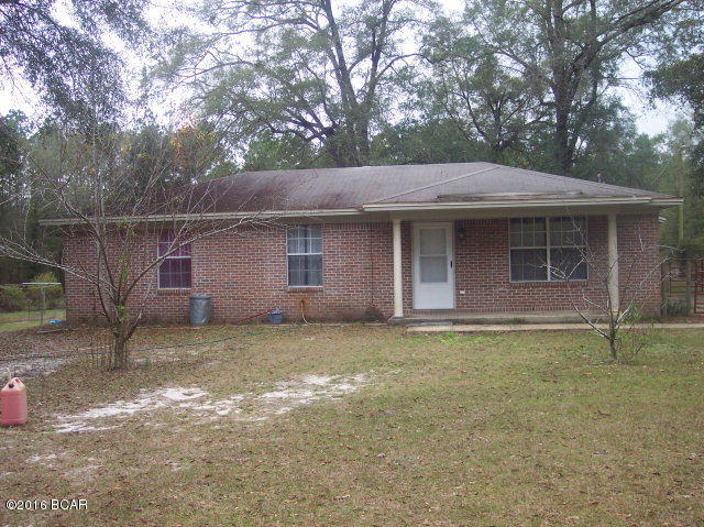 If you are looking for quiet, country living, this is the place for you. Entering from the front porch, you will find an open concept living area that offers a living room open to the kitchen and dinning area. In the kitchen, ample oak cabinets give you plenty of storage, and a multi-tone ceramic tile backsplash complements the granite look of the countertops. Stainless steel appliances complete the updated kitchen. As you walk down the hallway to the bedrooms notice the curved corners on the walls. Ceramic tile throughout the high traffic areas of the house make floor maintenance a breeze! Carpet covers the floors of each bedroom. This 3 bedroom/2 bath home sits on 2 acres that is fenced and cross fenced, with plenty of space for a large vegetable garden, your horse and chickens. The 24x24 barn is partially enclosed making a great place to store all of your lawncare equipment or a tact room if you have a horse. Do you enjoy fishing? There is a small pond in the pasture area behind the barn.
