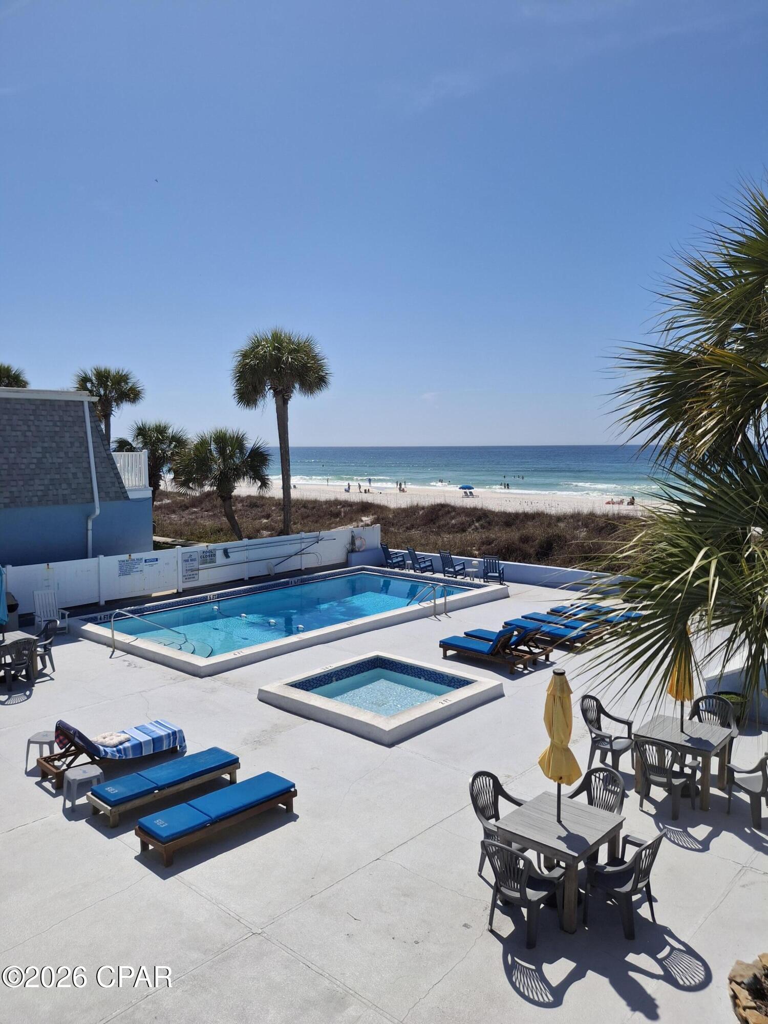 Panama City Beach Get-Away! Cozy 1BR/1BA beautifully furnished and decorated just steps away to ''World's Most Beautiful Beaches''.  Newer LVP flooring, tile bath and shiplap. Stingray has pool, kiddy pool, parking in front of building, extra parking across the street and onsite laundry.  Short term rental can sleep 3.  Dining, shopping, fishing, golf and entertainment within minutes away.  All dimensions are approx.
