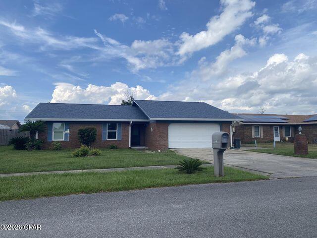 Nice quiet area, JUST Minutes to Tyndall AFB and Public boat ramp that takes you out to the Gulf. This brick 3 bedroom 2 bath with a nice size back yard is ready for you... It has a large covered deck, HUGE workshop Beautiful corner fireplace...Just ready for you to make it your own. Back yard is fenced for your Dog already.. Best thing is NO HOA to bother you...Put your boat or camper in your driveway no one will knock on your door....Great fishing just up the strret.. especially if you love to catch Mullet. I use to bring my kids there by the bridge to let them play in the water and see the stingrays and dolphins