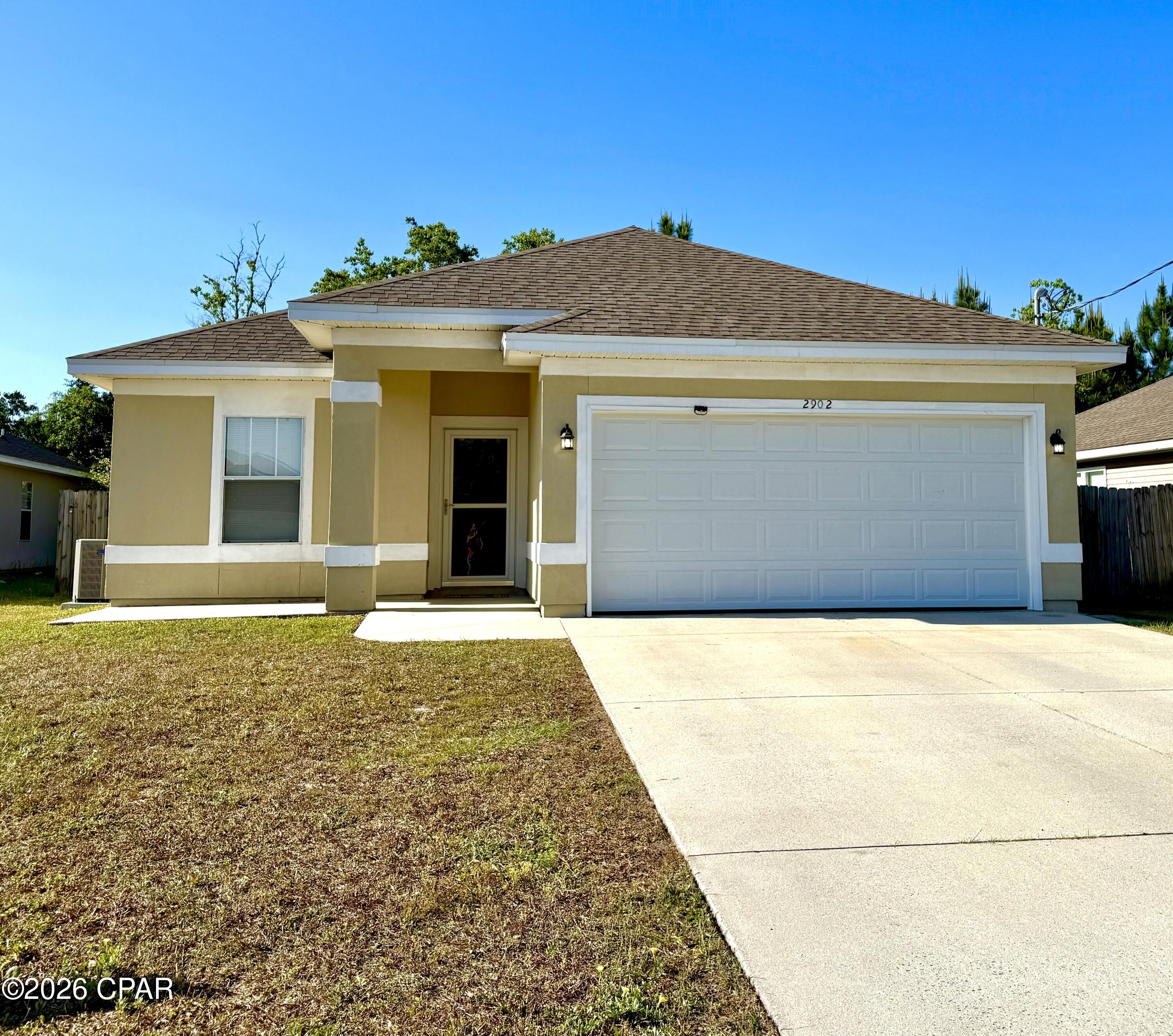 UNEXPECTED OPPORTUNITY - seize the moment! This beautifully maintained single-family residence in the heart of Panama City presents a unique chance for ownership. The property boasts three bedrooms, two bathrooms, and a two-car garage with a hurricane-rated door. Recent renovations include fresh paint throughout and new luxury vinyl plank flooring. The fully fenced yard provides a serene retreat for relaxation. Strategically located, this residence offers convenient access to Tyndall Air Force Base, beaches, and the bay within a 25-minute commute. Experience the epitome of low-maintenance living and indulge in the attractions Panama City and its stunning beaches have to offer!
