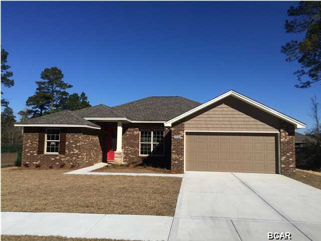 New construction brick home in Lynn Haven's Azalea Place Subdivision offering easy access to Panama City's main shopping corridor, Tyndall AFB, and the Naval Coastal Systems Base. Interior of home offers upgraded lighting fixtures, super durable Mohawk laminate wood flooring, open living and dining room, kitchen with local built cabinets, granite counters, large island, and stainless appliances, master suite with tray ceiling, separate shower and tub, double sinks, and walk-in closet, recessed lighting, crown moldings, and Wainscot on walls. Exterior features all brick siding, two car garage, fully sodded yard with sprinkler system, covered porch, and sidewalk.