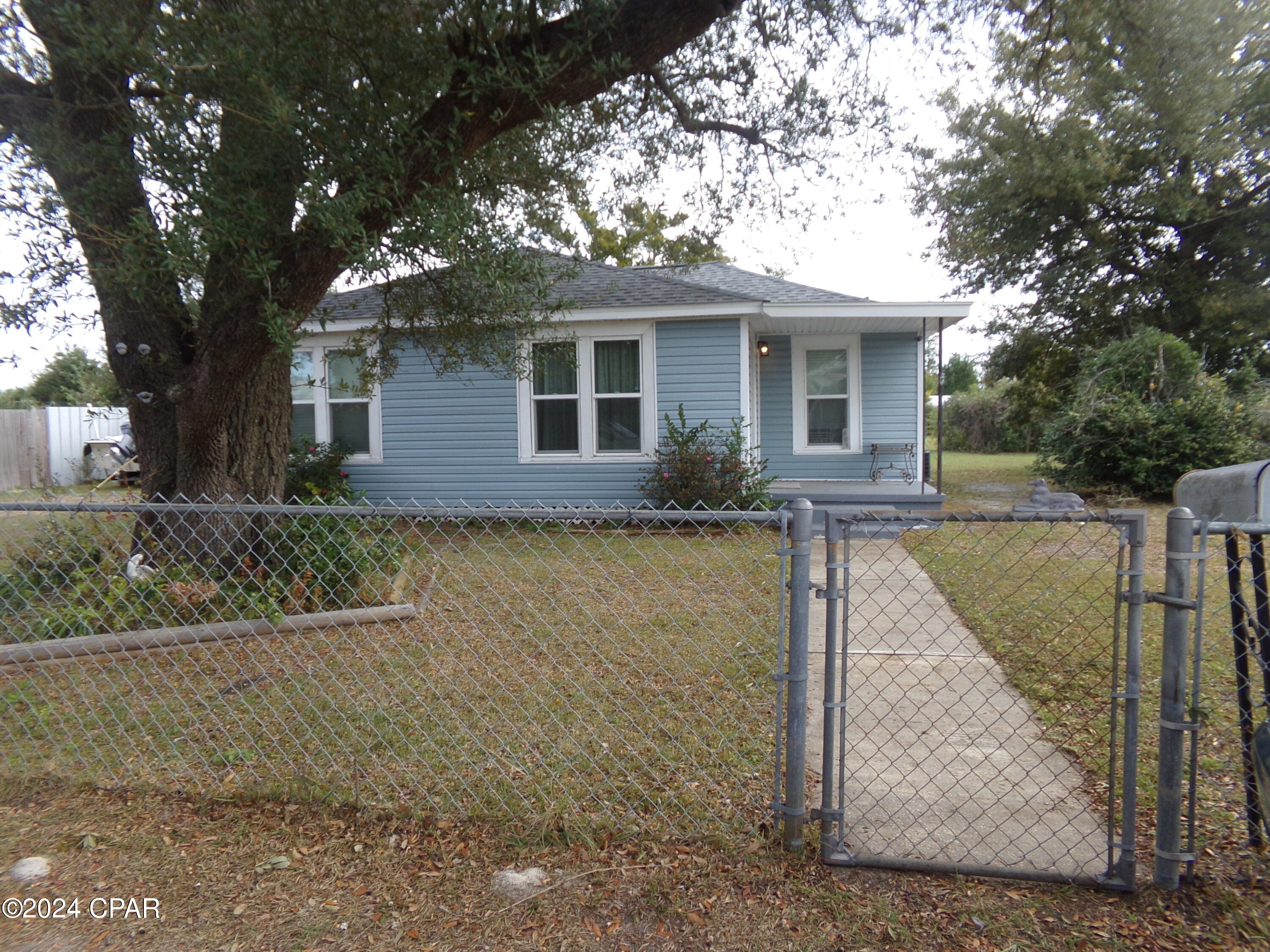 Adorable quaint 2/1 Home located in the Millville area. Within walking distance to the dollar general and not too far from dining, shopping, schools and TAFB. All sizes, measurements and zoning are approximate please verify if important. Must have at least a 625 credit score to qualify.