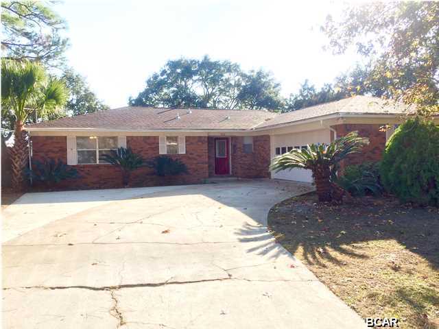 Tucked away in a private setting, this beautiful updated waterfront home is a hidden gem and full of potential. This all-brick contemporary 3 bedroom 2 bath home has 95 feet of water frontage with a seawall on the immaculate East Bay! Be sure to bring your kayaks and paddle boards. The large kitchen has a breakfast bar perfect for entertaining guests. The three bedrooms are decent sized and the floor plan is very spacious and open. When it's too cold to play out on the water come inside and get cozy next to the elegant fireplace in the great room. The backyard is naturally shaded and located on a large enough lot to put in a pool or just enjoy watching the kids play around. Grab a hammock, put your feet up, and relax while watching the dolphins play around in your backyard. This home is