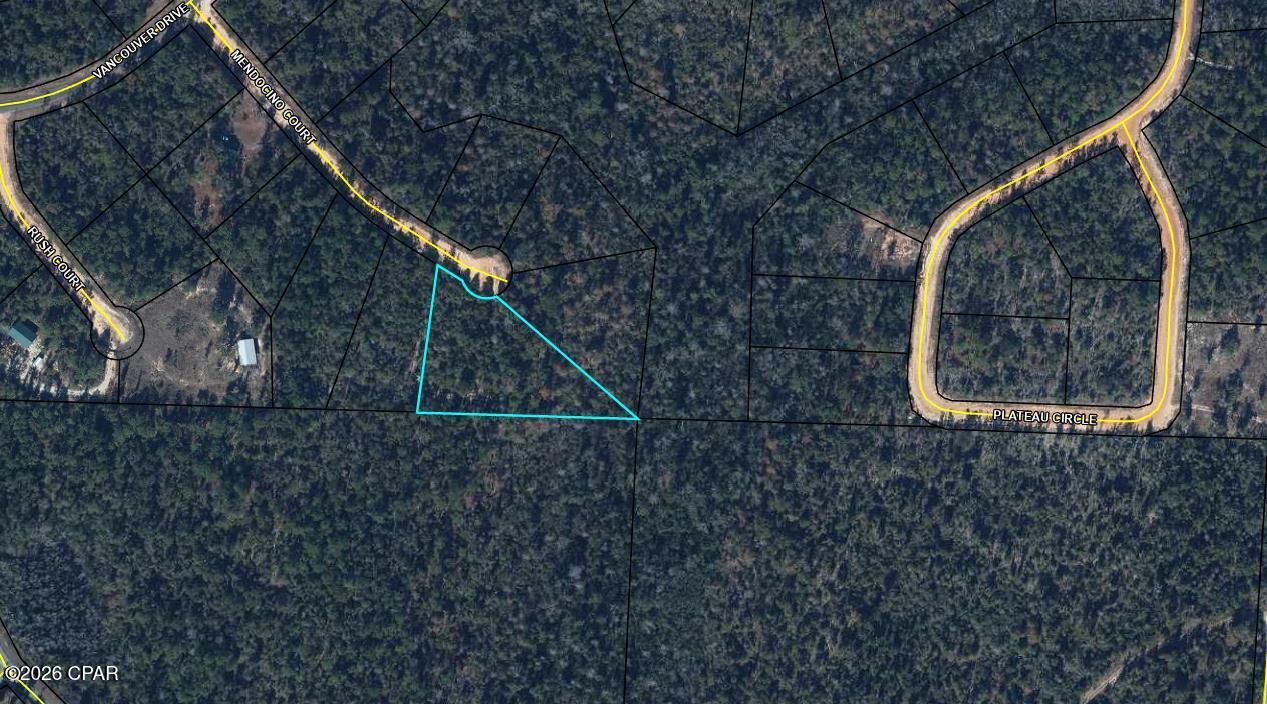 1.75 acre lot to either build your dream home or place your new manufactured home in the unique community of Compass Lake in the Hills.  No mandatory HOA but if you choose to be a member you will have access to all the amenities that the association offers. These include swimming pool, tennis courts, cabin rentals, RV spaces, and more. Quiet, peaceful country living, yet still a reasonable commute to Panama City and all that is offered there. Lot size to be verified by buyer.