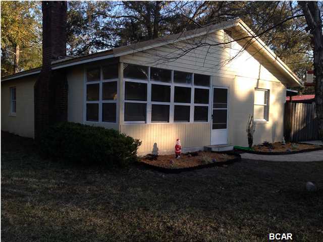Cozy Lynn Haven Home close to everything! This 3 bedroom, 1 bathroom home has a nice living room with a fireplace accent, large eat-in kitchen with plenty of storage, nice size bedrooms, remodeled bath, screened in porch, covered porch, storage shed and a fenced in yard. The inside has been completely painted from ceiling to baseboards! Small or medium dogs allowed.
