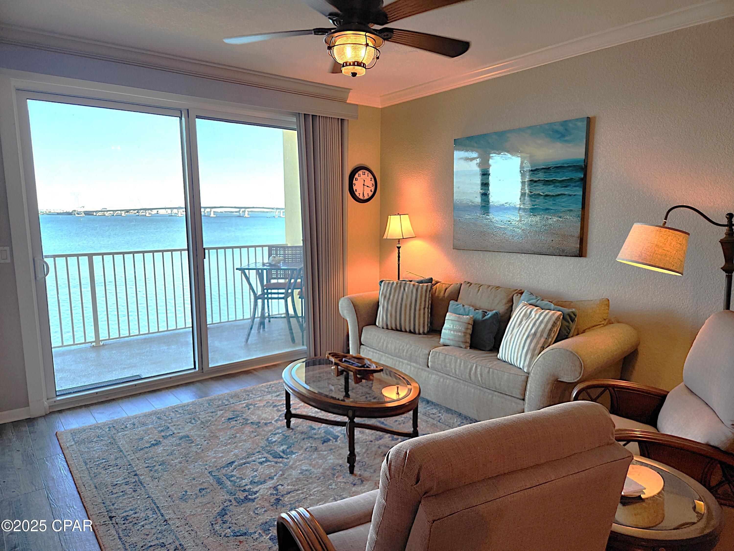 JJUST REDUCED! STUNNING BAY VIEWS...sip your coffee and watch the sunrise or moonlit nights on your expansive balcony!  Hibiscus is a One of A Kind Boater and fisherman's dream!  You can be at Shell Island or the gulf within 15 mins!  The complex features a private marina including boat slips and docks available for rent or sale.  The expansive fishing pier extends 400+ ft into the Bay that can be used at night as well as it is fully lit. This 2br 2ba unit has views from the living room and the Master Bedroom as well as access to the patio from both!  The living room also has built in cabinetry with an electric fireplace for ambiance on those fall and winter evenings.  The large kitchen allows several people to enjoy cooking and entertaining with a large pantry/ laundry with a pocket door to maximize use.  Hibiscus is immaculately landscaped and has a host of amenities including a large Bay front pool and hot tub, gas grills and fire pit area.  Also onsite are a tennis court, pickle ball court, indoor gym and community room with a Bay view as well.  The HOA fees are comprehensive and very affordable.  They include everything except electricity.  This allows comfortable stress free living !! Make your appointment to see this amazing unit today!!!