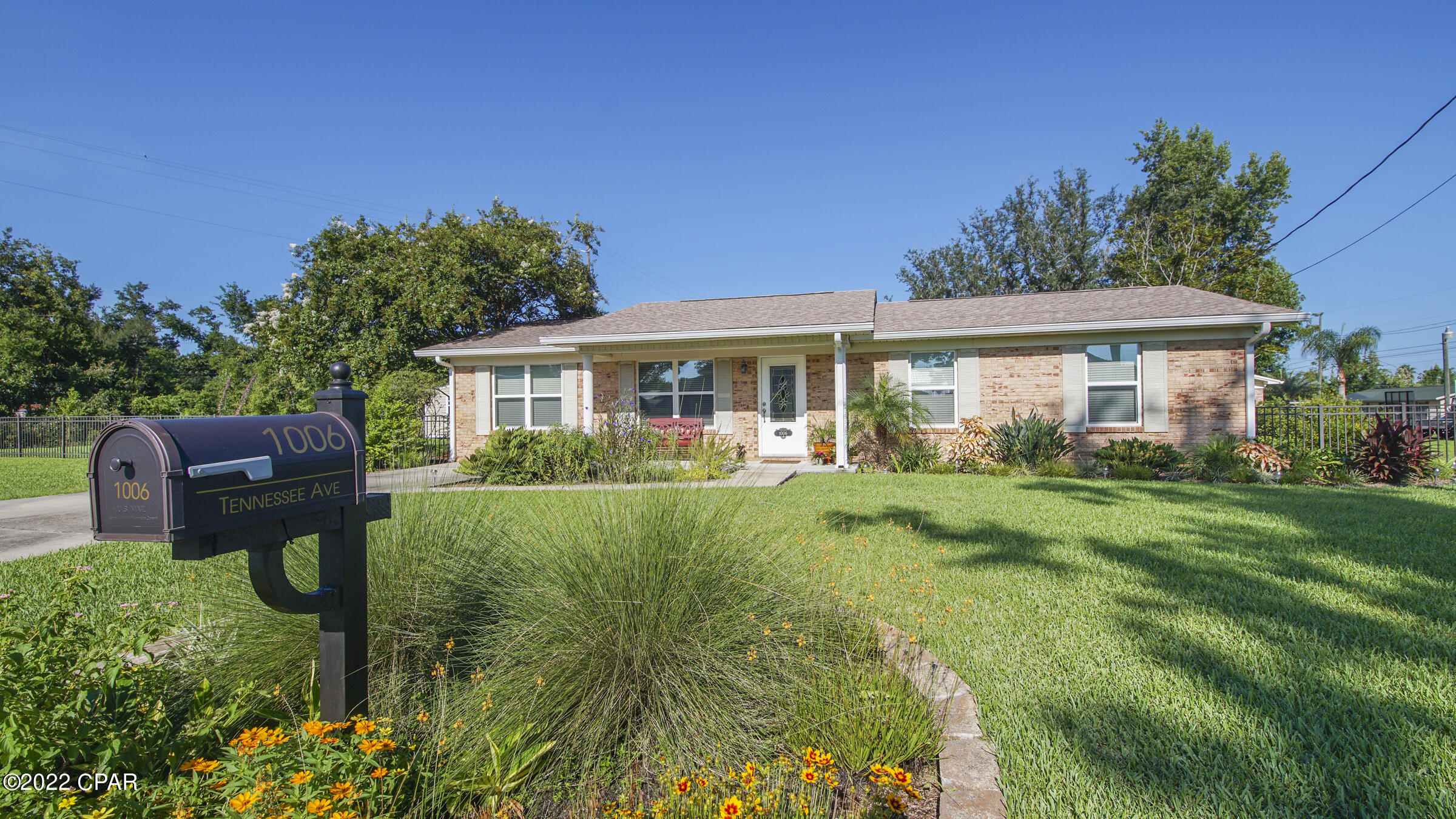LYNN HAVEN HOME ON CORNER LOT! The interior of this attractive home features 3 bedrooms, 2 full baths, 2 living rooms, ample natural light & an interior laundry room. The kitchen is open to the dining area and has a pantry & stainless-steel appliances (washer & dryer also convey). The exterior features an XL landscaped corner lot, irrigation, a fenced backyard, a rocking chair style front porch, a covered back porch (great for outdoor entertainment), a front driveway, a 12x20 storage shed/workshop & a side driveway for extra parking & backyard vehicle access. Updates include HVAC, Roof, Windows, Water Heater, Insulation, etc. Golf Cart Community! Walking distance to Lynn Haven Elementary & Kinsaul Park. X Flood Zone. No HOA. Call today for your own private preview.