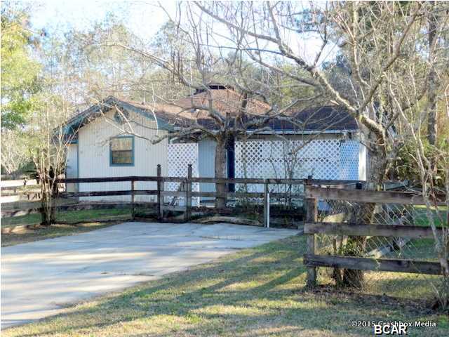 Opportunity Is Knocking! This adorable home sits on a large lot in a quiet setting. This home does have a lot of potential and the price is fantastic! Home sold as is. All information is approximate and should be verified.