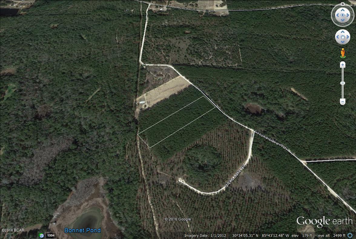 ARE YOU LOOKING FOR SPACE AND PRIVACY??? YOU HAVE FOUND IT!!! This fantastic parcel is over 4.5 acres and located in the beautiful community of Woodland Meadows At Hicks Lake. It is less than 5 minutes to Hicks Lake Landing and just a short drive to Panama City Beach! Easily accessible, conveniently located, and best of all, NO HOA dues. Spend the day fishing (the boat launch is only a mile away), birdwatch, hike, or just relax on your own piece of paradise. This is a great buy in a great location. No mobile homes allowed. CALL TODAY!!!