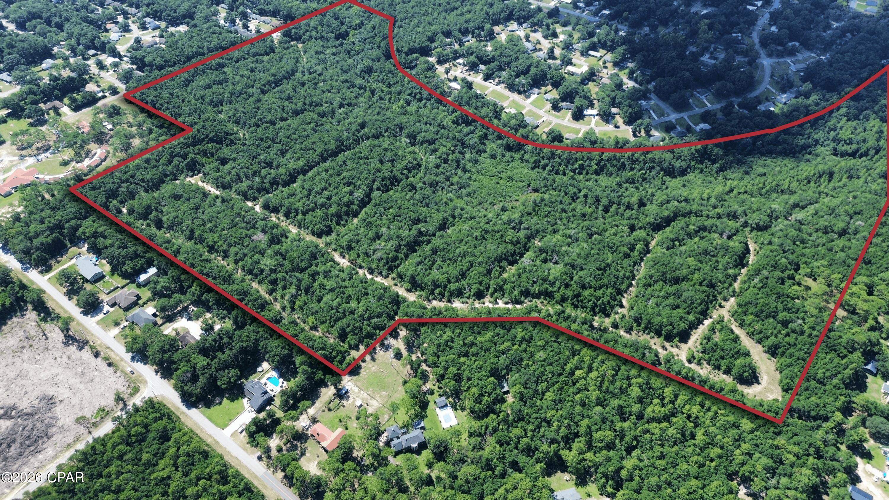 The Phillips Portfolio represents a once-in-a-generation opportunity to invest in one of America's most dynamic growth markets. The Portfolio has been strategically assembled to include an inventory of 43 high-value assets. These assets span across Northwest Florida and include residential, commercial, and industrial assets. Structured with current income-producing, in-process development parcels and greenfield land opportunities. The Phillips Portfolio offers above-market return opportunities across the immediate, medium, and long-term investment horizons. Inquire with Listing Agents for full portfolio information.

Legacy Place offers 81.58 acres of prime
development land in the thriving Crestview market of North west Florida. Ideally situated with access to schools, major roadways, and growing residential communities, this expansive tract is well-positioned for a residential subdivision, mixed-use development, or long-term land investment. With Crestview
experiencing sustained population and economic growth, Legacy Place represents a strategic opportunity for builders and developers to capitalize on high demand in a rapidly expanding region.