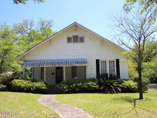 A touch of nostalgia will greet you when you enter this vintage home of yesteryear! Enjoy the large living room with fireplace, formal dining room with French Doors, large roomy bedrooms, an office and more. There is a room off the master bedroom with a sink that would make a great hobby room or sewing room. Enjoy the large covered front porch and the yard with white fencing. A yard building is also included.