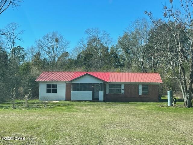 This is a brick 4 bedroom 1 bath brick home in the country on one acre.  The garage was turned into the 4th bedroom.    This is a good investment property.  You will need to do repairs and updates.