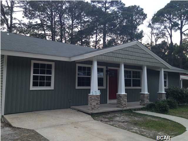 Completely renovated Craftsman Style home located in the popular Cove area. This 3 bedroom 2 bath home has recently been renovated and features tiled floors and new wall to wall carpet throughout as well as new appliances and granite counter tops in the kitchen. The living area is very spacious and is open to the kitchen and dining room. An additional sitting area or family room is just off of the front of the home, giving even more space inside this nearly 2000 square foot home. All of the bedrooms are very large and one bedroom is split from the others for more privacy. Fresh paint and flooring throughout make this one feel like new. The exterior of the home also received an elegant Craftsmanmake over. In addition to the great space in the home, there is an oversized two car garage
