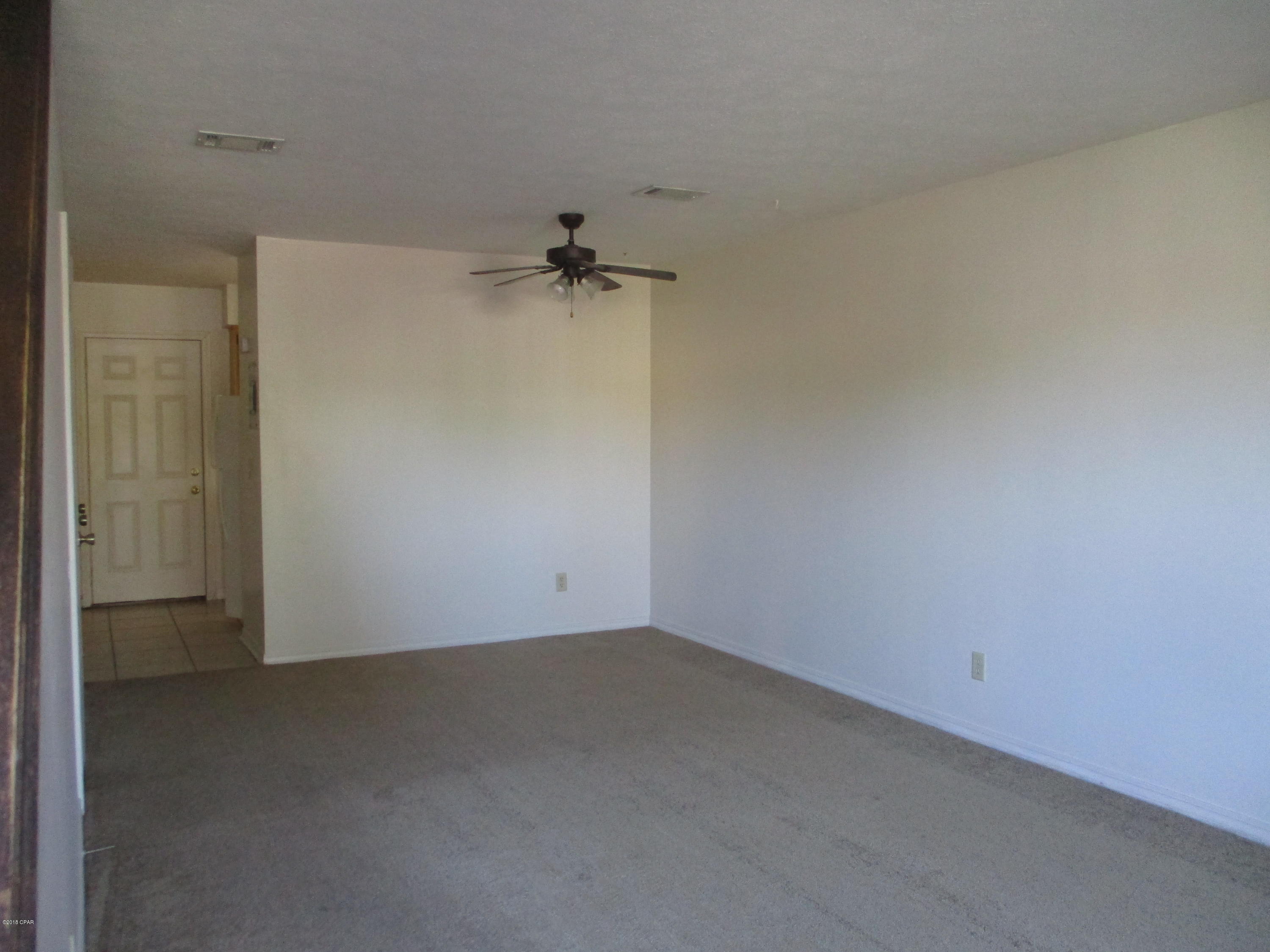 Nice town home in quiet area, walking distance to Northside Elementary, centrally located between 15th and 23rd Street shopping and amenities.  Outside lock storage, patio, balcony, washer/dryer closet. NO PETS  -  non-negotiable.  $30 application fee, one year lease; Listing agent is owner.