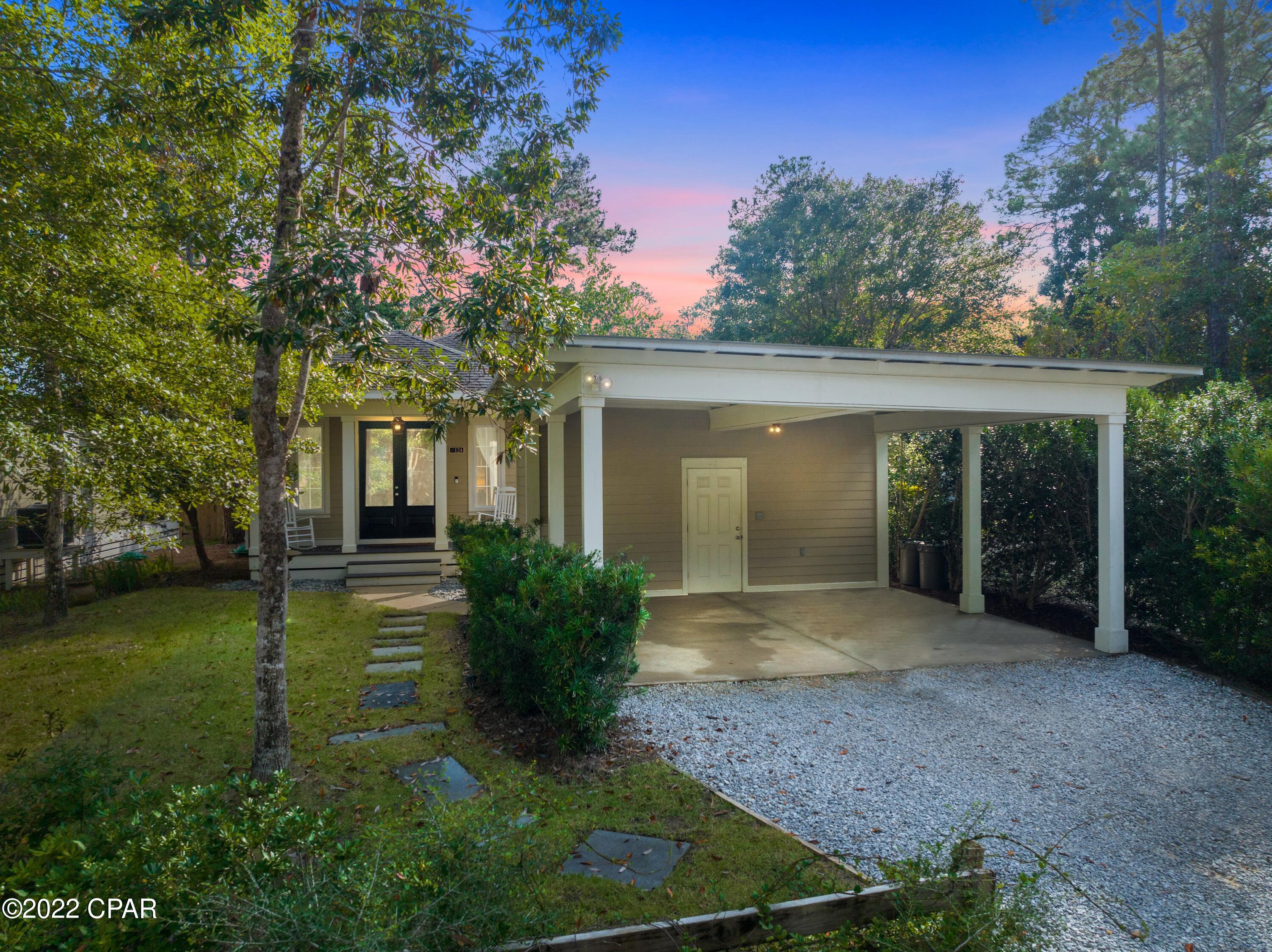 CURRENTLY UNDER CONTRACT, SELLER WILL CONSIDER BACKUP OFFERS.Looking for the Florida lifestyle without the noise and crowds?  Check out this custom-built split floor plan one level with supercool detached bonus room perfect for an office or bedroom. This gem is nestled between 30a and Panama City Beach, STR allowed, flood zone x, and super convenient to Grayton Beach, Eden Gardens and a short drive to restaurants, shopping, and all the hot spots on 30A. Well maintained with new landscaping and a full irrigation system, you'll love the cozy covered patio overlooking lush trees walking distance to the bay. Featuring an open concept floor plan with large trim and crown molding, you'll enjoy the huge pantry in the laundry, the convenience of a center island for entertaining, and a wet bar. You will also find an incredibly spacious primary bedroom with loads of closet space and plenty of room for a Peloton and an entertainment system. The large primary bath includes a walk-in shower, double vanity sinks, and a separate linen closet, in addition to the spacious walk-in closet perfect for any wardrobe. Finally, there is a gorgeous private guest suite for entertaining family and friends. Home was built by a builder for himself and includes a number of high-end touches. It is in phenomenal condition.