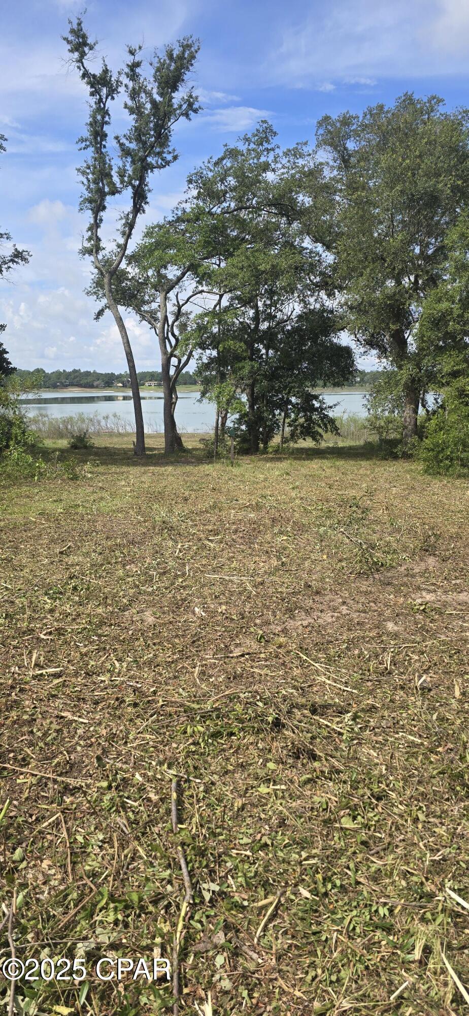 Cleared vacant lot on desireable Boat Lake in the Sunny Hills community. One of the last lots remaining on Boat Lake. Lot is cleared and ready for you to build your dream home and relax by the lake. Survey available.