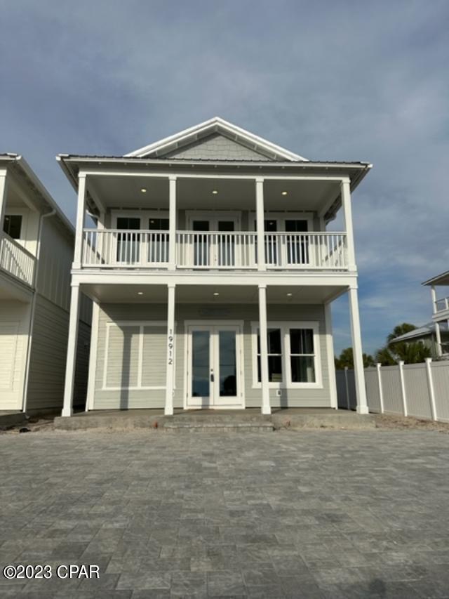 Newly Furnished, completed Construction on this Coastal Luxury Home, directly on Front Beach Road on the West End of Panama City Beach in Laguna Beach. Great investment opportunity with projected annual rental earnings of $187,000 plus! This 5 bedroom, 4.5 bath, 2-story home has breathtaking views of the Gulf of Mexico.  This home features a Chefs Kitchen with upgraded stainless appliance package including French door refrigerator, gas cooktop, dishwasher and wall oven/micro combo Enjoy swimming in the Private, salt- water pool with gas pool heater. The home also boasts a gas tankless water heater, Hurricane, impact rated windows, Metal Roof, Hardie Siding, and 8' interior/exterior doors. There are Master Suites On both levels, with an additional guest suite located on the upper leve This home's convenient location makes it a great income producing property or secondary home. Just steps to the White Sands and Emerald Waters of Laguna Beach and only minutes from Pier Park Shopping, Dining and Entertainment. Just east of Rosemary Beach .30A.