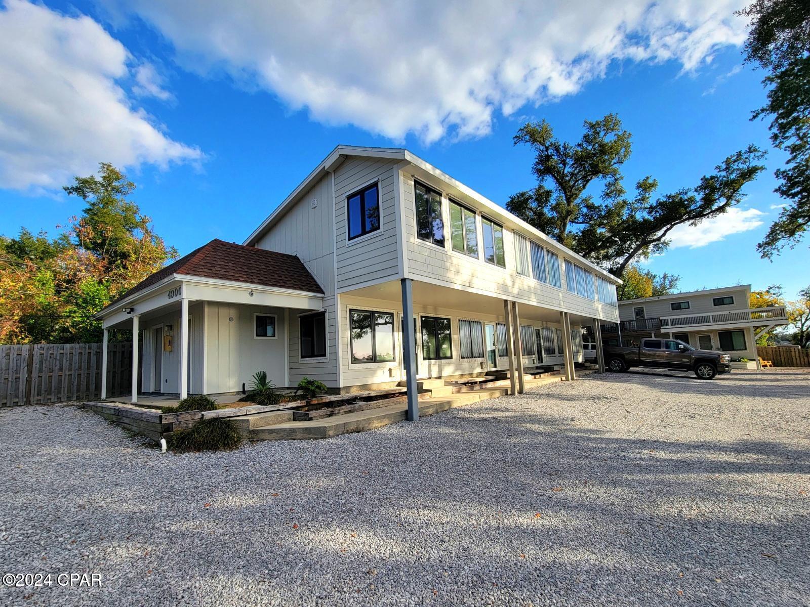 This is a beautiful private waterfront townhome. This 1 bedroom, 1.5 bath hidden gem comes Furnished. Additional features include new Stainless appliances, tile and plank flooring, granite countertops. Spacious Master Bedroom overlooking the Bayou. Lovely Master Bath with double vanities and walk in closet. There is a community laundry room with a Washer and Dryer which is part of the Common Area. The community area includes a Gazebo, pavilion with grilling station, and the dock. Mariners Cove is located just a very short distance from the Intercoastal. Convenient to shopping, restaurants, Tyndall AFB, and much more. Don't miss this wonderful little hideaway! Call To schedule a tour.