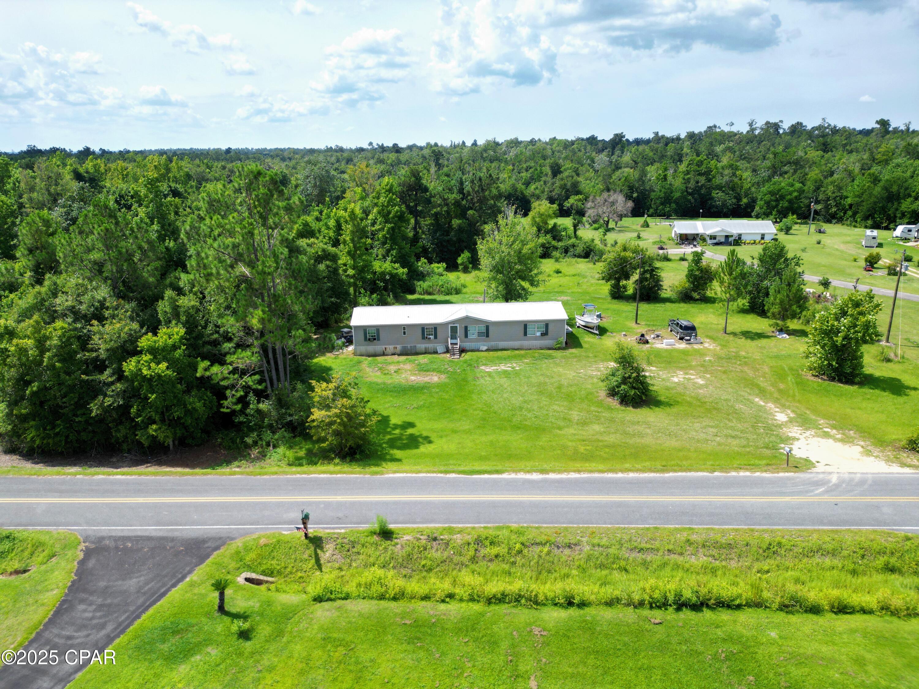 !!Price Improvement!!

20655 NE Parrish Lake Road, Blountstown, FL 32424 - 3-Bedroom Home on 1.25 Acres with Living or Rental Potential

Set on 1.25 acres in Calhoun County, this 3-bedroom, 2-bath 1994 mobile home offers flexibility for buyers. Whether you're looking for a comfortable place to call home or an investment property, this one checks both boxes.

The home is currently rented for $1,000/month, and the tenant would like to stay, providing immediate rental income if you choose to keep it as an investment. Or, if you'd prefer to move in yourself, the property offers plenty of space and potential to make it your own.

Inside, you'll find a practical layout with a spacious living area and good flow between rooms. Outside, the land provides room for pets, gardening, or other projects—all on a peaceful setting with room to grow.

If you're searching for property that works as a personal residence or an income-producing asset, this one is worth a closer look.

Please note: This home has been previously moved and is not eligible for traditional financing. Cash or specialized financing will be required.