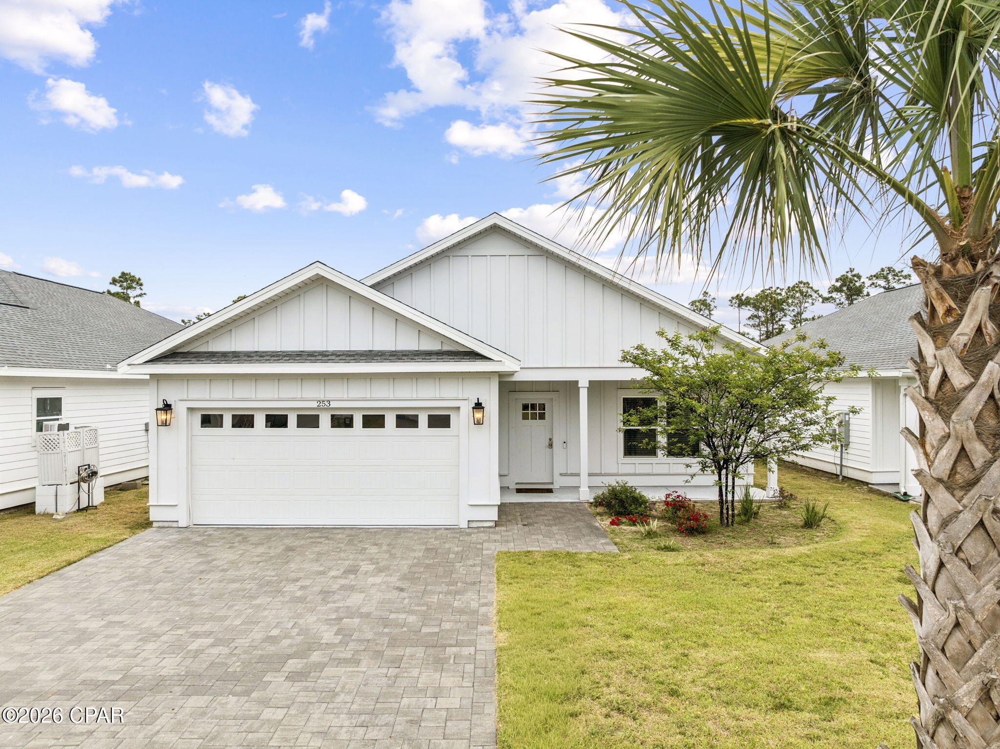 Welcome to this stunning 2023-built 4-bedroom home in the gated community of Laguna Haven on the quiet west end of Panama City Beach. This home beautifully combines modern luxury with relaxed coastal living.
This beautiful floor plan offers 4 bedrooms, 2 bathrooms, and 1,909 sq ft of bright, open space on a spacious lot. Whether you're looking for a primary residence, family vacation home, or high-earning short-term rental (fully permitted), this home checks every box - and you're just under a mile from the white-sand beaches.
Inside, you'll love the premium finishes: durable wood-look porcelain tile throughout, soaring 9- and 10-foot ceilings with crown molding, and beautiful designer lighting. The gourmet kitchen features eye-catching Calacatta Bravo quartz countertops, soft-close Shaker cabinets, a generous walk-in pantry, and Samsung stainless steel appliances. The spacious primary suite includes tray ceilings and a luxurious ensuite bath with double vanities and a custom-tiled walk-in shower. The additional bedrooms are bright and flexible - ideal for kids, guests, or a quiet home office.
Outside is pure Florida magic. Step onto your covered porch and enjoy peaceful views of the fully landscaped backyard with its soothing water feature. The yard is lush and low-maintenance with irrigation, plus you have a 2-car garage and hurricane shutters for total peace of mind. The gated community offers maintained grounds, trash pickup, low HOA fees, and flood zone X for peace of mind.
Located on the quieter west end, you're minutes from 30A, Pier Park, top dining and shopping, and schools - all while enjoying easy beach access without the heavy traffic.
This move-in-ready gem feels like home the moment you walk in. Whether you picture morning coffee on the porch, sunset evenings by the water feature, or family gatherings in the spacious kitchen and living areas, this property truly has it all.
Schedule your private tour today and come experience coastal living at its best in one of Panama City Beach's most desirable gated communities.