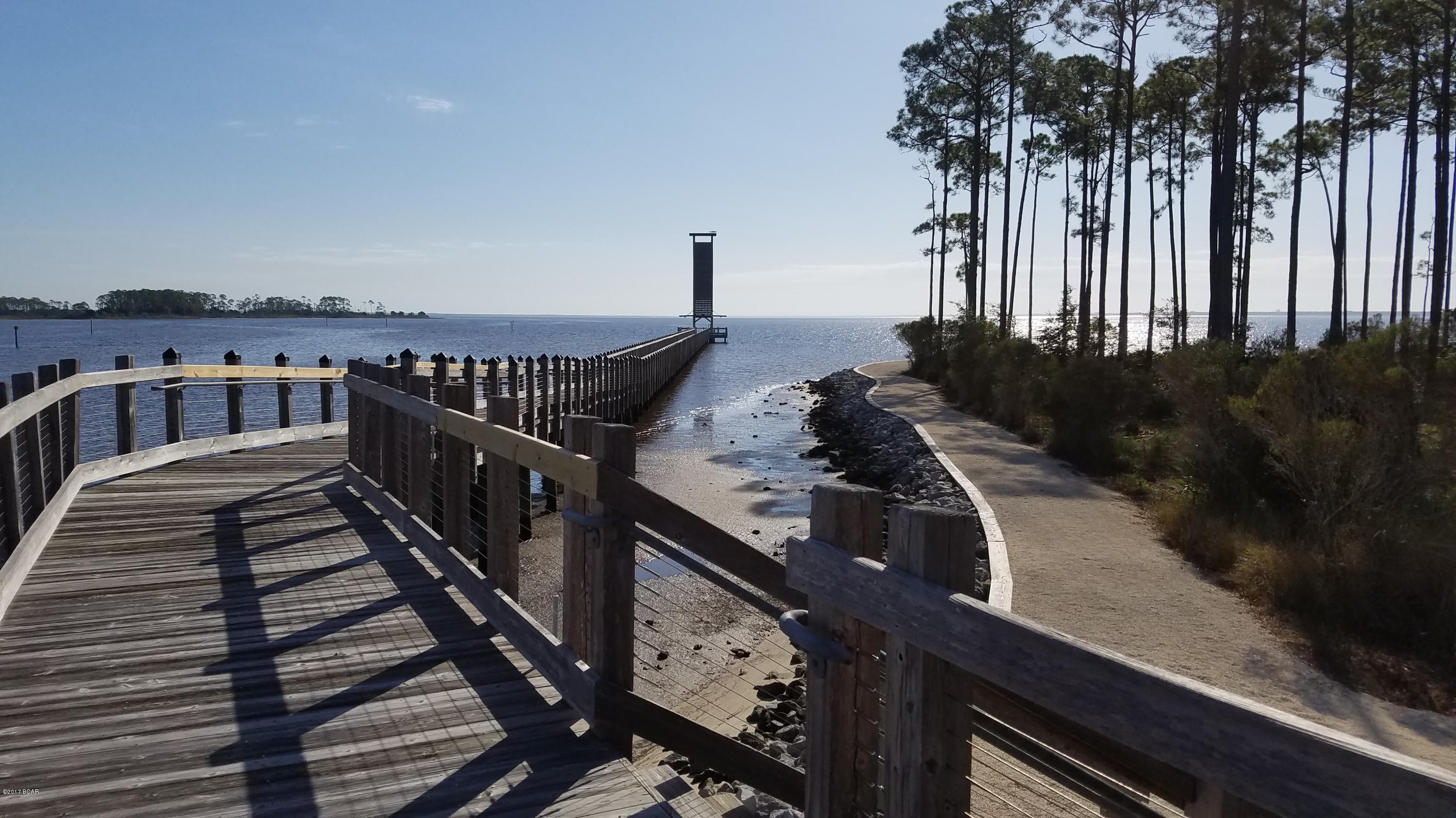 Corner lot available for Purchase. RiverCamps is a 1,500 acre community featuring 7 miles of private trails/boardwalks. Community Fitness Center, Boat Launch, Boat Docks, Zero Entry Pool, Pavilion. All Beautiful!  Close to Northwest Florida International Airport, white sandy beaches, golf courses, dining and shopping.
