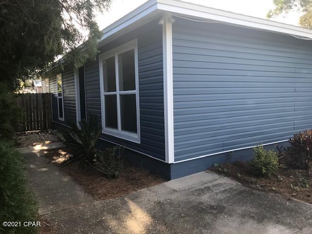 Location, Location, Location!! Live & play in Panama City Beach in this wonderful Beach House! This lovely 3 bed 1-1/2 bath (master bath has no shower) This home has a large fenced backyard & is nicely updated inside and out. Kitchen has new stainless steel appliances & granite counter tops, bathrooms have new vanities & toilets, new vinyl plank flooring, ceiling fans, lighting & fresh paint through out. You'll enjoy Boating, Swimming, Fishing and much more  so bring your water toys, Best of all, you won't have far to go as it's only a block and a half from the Dolphin Boat launch with access to St. Andrews Bay & it's with in walking distance (0.3 of a mile) of the Gulf of Mexico. Plenty of dining and shopping options as well. Call today to schedule a tou