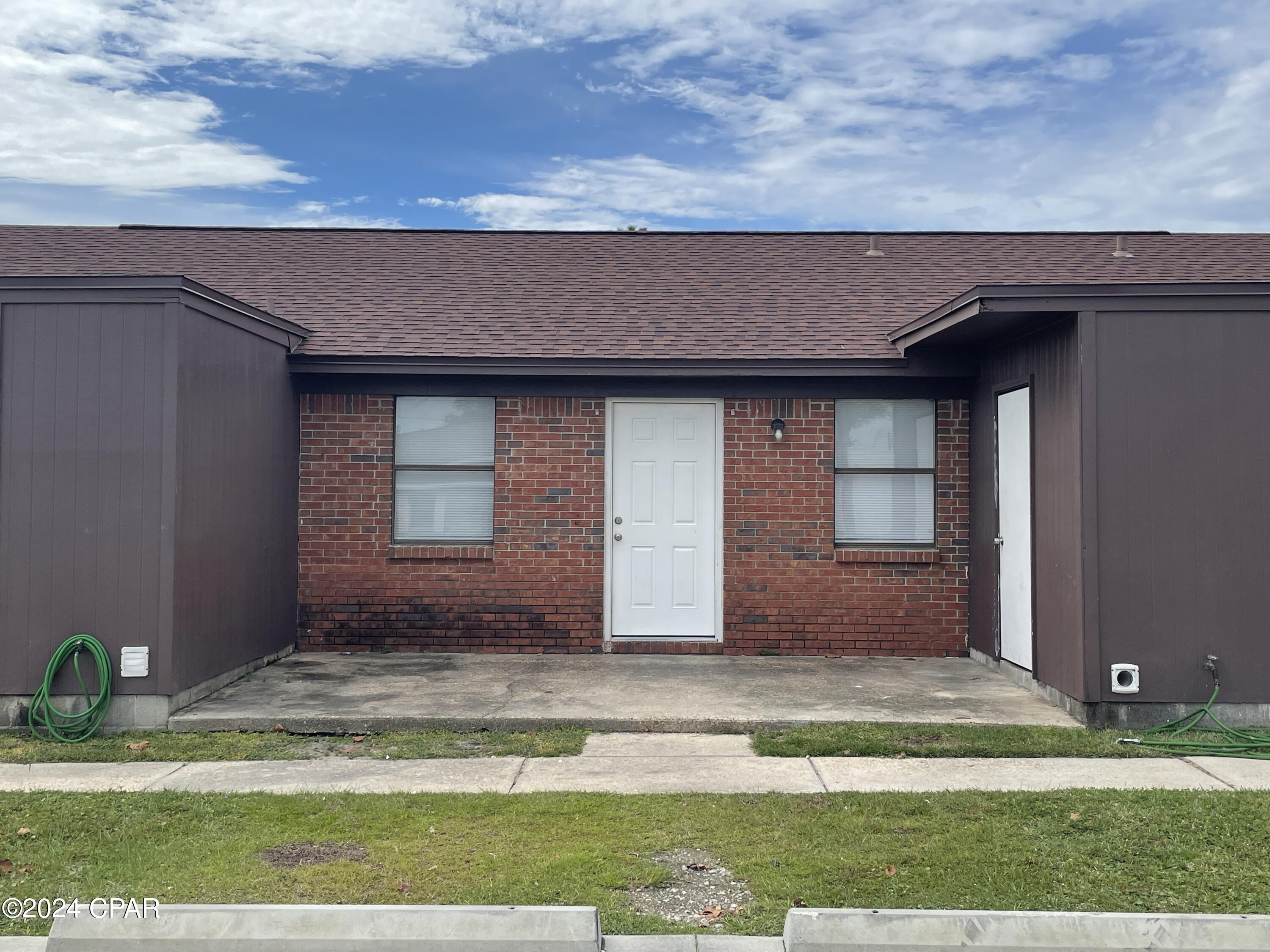 2 bedroom 1 bath apartment in triplex. Utility room with w/d hook ups. Close to shops. lawn care included