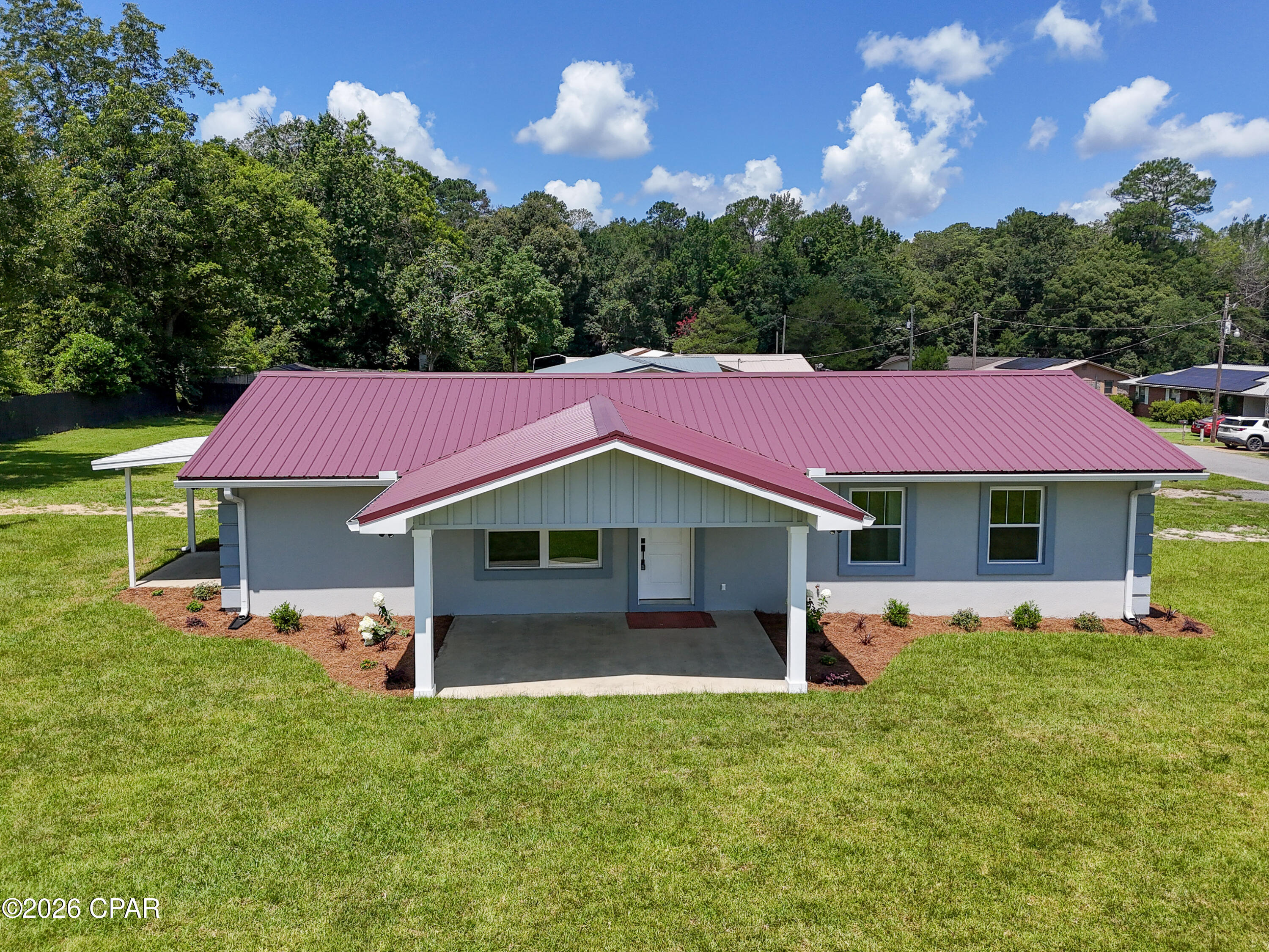 Welcome to 907 Rangeline Street, Bonifay, FL 32425--a beautifully renovated 3-bedroom, 2-bath home that's completely move-in ready and loaded with modern upgrades.

Step inside to discover an inviting open living space featuring durable luxury vinyl plank flooring, abundant natural light from new energy-efficient windows, and stylish finishes throughout. The beautifully updated kitchen is the centerpiece of the home, boasting granite countertops, stainless steel appliances, and ample cabinet and prep space for everyday living or entertaining.

The spacious primary suite offers a private retreat with a stunning ensuite bath featuring a double vanity and a large walk-in tiled shower. Additional upgrades include a tankless hot water heater, providing endless hot water while maximizing energy efficiency.

Conveniently located in the heart of Bonifay, this home offers small-town charm with easy access to some of the region's most popular destinations. Enjoy being approximately 45 minutes from Panama City Beach, Northwest Florida Beaches International Airport, and Dothan, Alabama, making commuting, travel, shopping, dining, and world-famous Gulf Coast beaches all within easy reach.

Whether you're searching for your first home, looking to downsize, or simply want a beautifully updated property with modern finishes, 907 Rangeline Street is ready to welcome you home.

Schedule your private showing today and experience everything this exceptional home has to offer!