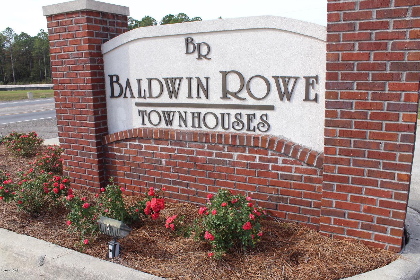 LakeFront Unit!  Super Floor Plan offering a Large Open Living area downstaris including Hardwood Floors, 9 ft. Ceilings, Granite Tile Counters and Crown Molding.  Upstairs has a Split Bedroom Plan with a den in the middle.  Baldwin Rowe is Fully Fenced and Gated at the Entrance.  Centrally Located, Priced Right!