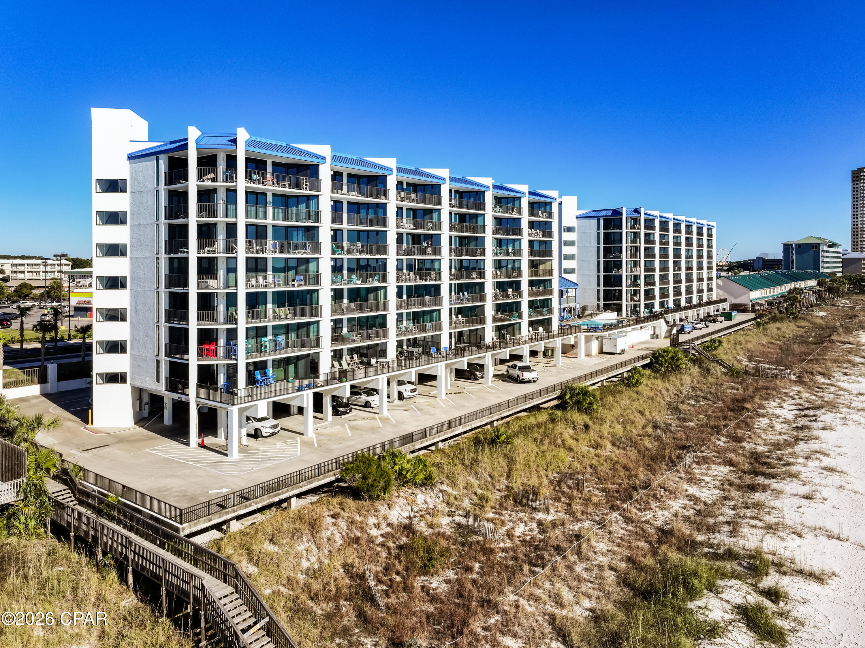 IMPROVED PRICING!!☀️ ENDLESS WESTERLY GULF VIEWS!☀️ This is a rare west-end three bedroom, wraparound residence at AquaVista. This exceptional corner unit offers unobstructed Gulf views stretching down the coastline in a low-density 7-story beachfront building. This unit was recently upgraded with brand-new hurricane-rated sliding doors and windows. Ideally located near Pier Park with easy airport access and strong rental projections. This is a rare opportunity not to be missed.