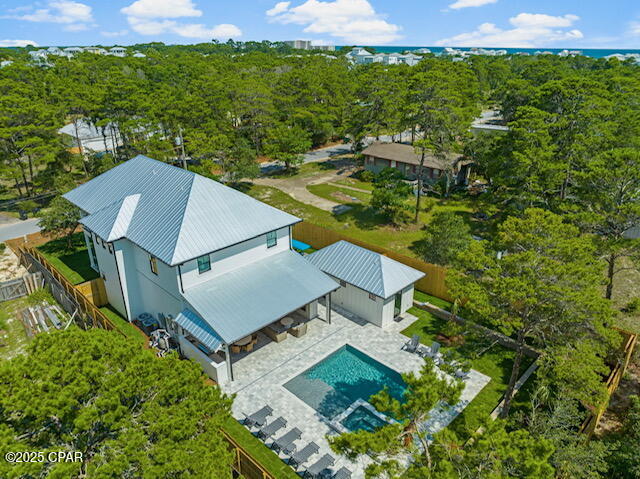 CURRENTLY UNDER CONTRACT, SELLER WILL CONSIDER BACKUP OFFERS. Ultra-Custom Inlet Beach Retreat
5 Bedrooms | 5.5 Bathrooms | 3,000+ Sq Ft | Private Pool & Hot Tub | Detached Garage & Full Bath | Fully Furnished | $200K+ Annual Income | No HOA | Prime Location.

Welcome to your private sanctuary in Inlet Beach, where sophisticated design, resort-style living, and an unbeatable location combine to create the ultimate coastal retreat. Whether you are seeking a luxurious second home or a top-performing vacation rental, this residence delivers in every way. Designed with comfort, style, and durability in mind, every detail of this home reflects thoughtful craftsmanship and timeless elegance.

Interior Highlights:
* Spacious open-concept floorplan perfect for gathering and entertaining
* Large designer chef's kitchen with Taj Mahal quartzite, oversized island, walk-in pantry, stunning tile & design
* Custom millwork throughout every room, plus select antique doors for added charm
* Professionally styled premium furnishings (sold fully furnished!)
* Thoughtfully designed built-in bunk room ideal for kids or guests

Resort-Inspired Outdoor Living!
Step into your own private backyard oasis—a resort-style saltwater pool with sundeck, oversized hot tub, and a fully equipped outdoor kitchen under a covered patio. The outdoor gas fireplace, lush landscaping, and ample seating areas make it ideal for entertaining year-round. Detached garage with extra storage for golf carts, bikes, and beach gear. Beautifully appointed outdoor pool bath for guest convenience. Spacious paver driveway with lots of parking.
Covered front porch and rear patio perfect for multiple relaxing areas.
Surrounded by mature palms, live oaks, and a manicured lawn. 

Unmatched Prime Location:
* Perfectly positioned in a peaceful, upscale enclave of Inlet Beach  
* Direct beach access (straight down the street)
* A short walk, bike, or golf cart ride away * Adjacent to Camp Helen State Park—enjoy fishing, paddleboarding, canoeing, and nature trails
* Moments from Rosemary Beach and all the shopping, dining, and energy of 30A. Enjoy the rare combination of peaceful privacy with vibrant beach town living!

Investment & Quality Highlights:
* $200K+ annual short-term rental income
* No HOA
* Built to high standards with low maintenance in mind
* Hurricane-impact windows & doors
* Energy-efficient spray foam insulation
* Structured wiring for modern tech
* Metal roof, Trex decking, and Hardie exterior for long-term durability
* Dual tankless water heaters & irrigation      well system

Luxury, Location, and Long-Term Value—All in One! From its stunning design and top-tier finishes to its income potential and beachside location, this home is more than a property—it's an opportunity.

Turnkey, high-performing, and unforgettable!! Don't miss out on this RARE GEM!
