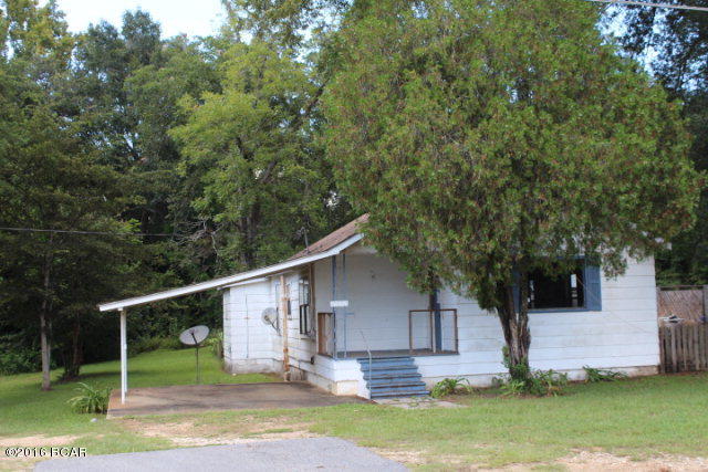 PRICE REDUCED!! This is a cottage style home located in town conveniently located to all local amenities. There is a large barn on the property. It has an inground pool (covered and secured). The property goes all the way through to Hwy 90 with approx. 92.4' frontage on 90. The home has had some updates. This is a great investment property! Make appointment to see it today!