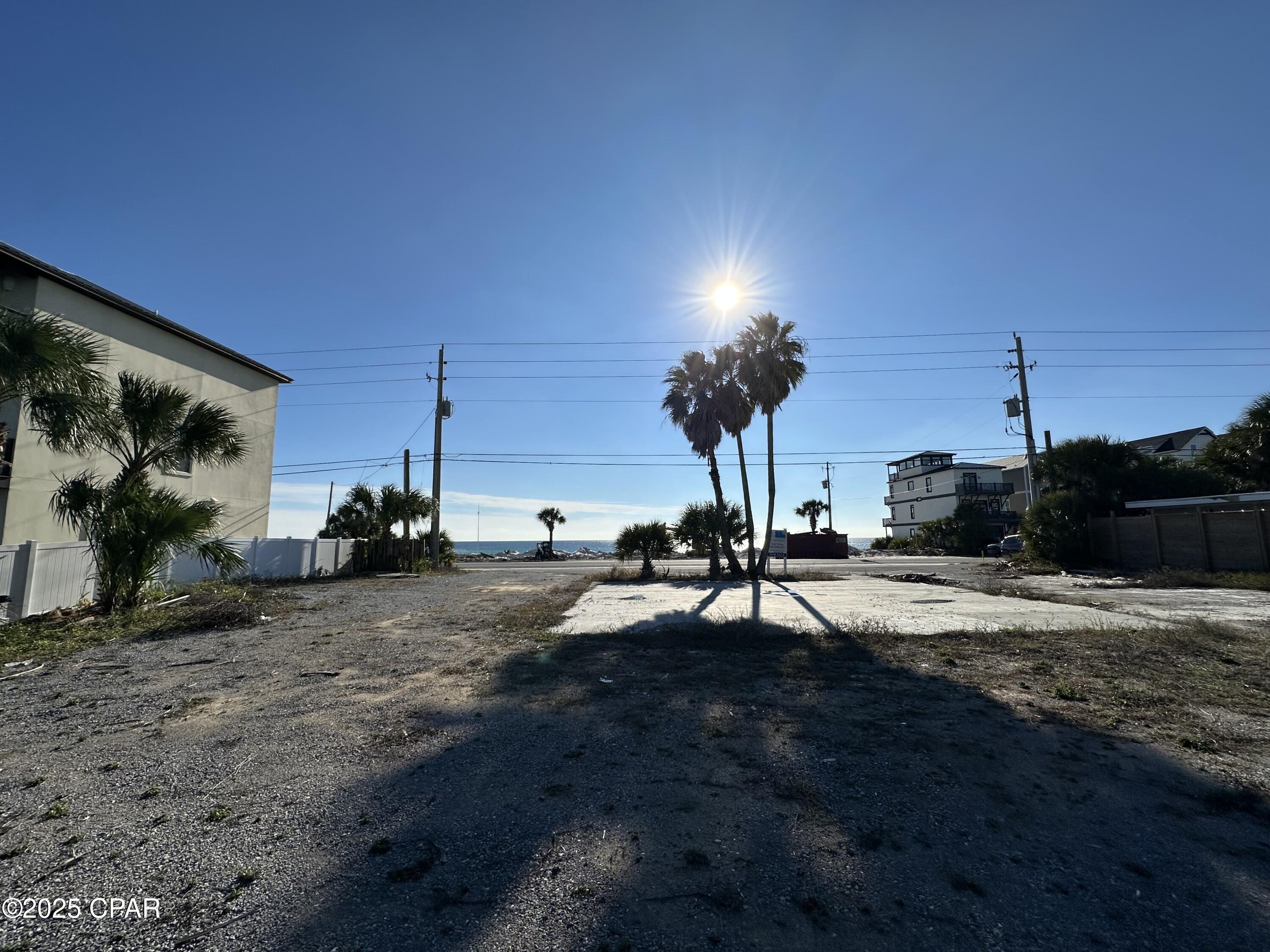 This listing is for two lots sold together but have their own parcel ID. Lots are across the street from the beach and the back of the lots are waterfront on a dune lake that is about 800ft wide. Located in the Laguna Beach area on the west end of Panama City Beach where there are many new construction homes and lots of new development. Just minutes from the 30A Pier Park, McGuire's Irish Pub. This is a low-density area filled with very nice new construction homes and vacation rentals.