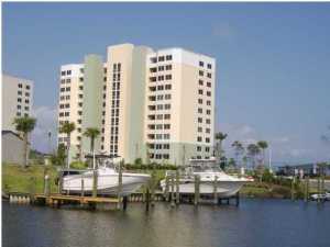 HIBISCUS BY THE BAY is a gated Bay Front residential condominium community sitting on an elevated 10 acre peninsula with 600 feet of water frontage on beautiful St. Andrews Bay. Geared for the boating enthusiast or the buyer looking for a luxurious permanent or vacation home. Just a 15 minute boat-ride from sugar white beaches, shopping and fine dining. Interior features include 9 ft ceilings, crown molding, granite counter tops, and large walk-in closet in the master bedroom. Living room and master bedroom have 8 ft sliding glass doors to provide easy access to the breathtaking view from the bay front balcony. Concrete walls separate each unit for strength, fire and sound proofing. The property also features a gated entrance, beautiful landscaping, furnished lobbies with