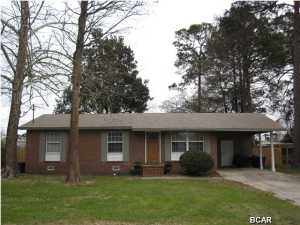 Absolutely adorable all brick home centrally located in Lynn Haven. This home has been fully remodeled all the way down to the studs and looks like something out of a magazine. Some of the upgrades and updates include a mahogany craftsman style front door, wood laminate floors, new cabinets in kitchen and bathroom, solid surface counter tops with under mount sink, stainless steel appliances, 6 inch baseboards throughout, subway tile shower with niche, and much much more. The fenced in back yard offers a new 16x16 custom deck and 20x12 all aluminum professional shed with 5 foot doors and ramp. The roof and all windows were replaced in 2009 and windows have plywood storm coverings for protection. This homes qualifies for 100% financing through the Rural Development program and payments