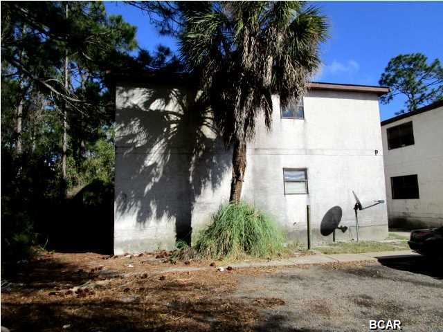 FOUR-PLEX LOCATION IN CALLAWAY and close to Tyndall AFB! Surrounded by a community of well-maintained units, this one is the diamond in the rough! The building has four, two-bedrooms units each with a full kitchen and one full bath. Great opportunity for solid rental income!