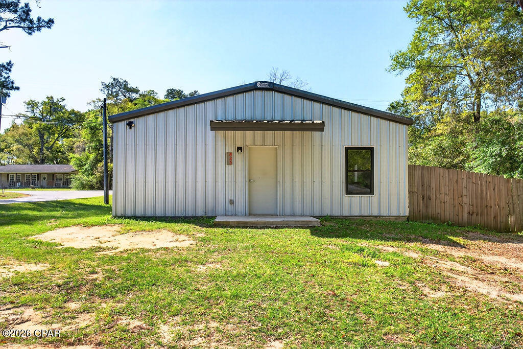 CURRENTLY UNDER CONTRACT, SELLER WILL CONSIDER BACKUP OFFERS! Discover this unique energy-efficient home on a desirable corner lot, designed for durability, sustainability, and modern living. Built with a steel-framed exterior engineered for 140 MPH wind loads and constructed with 67% recycled metal, this home offers exceptional strength and eco-conscious design.

Inside features an open-concept living and kitchen area, complemented by stained concrete floors and sleek metal ceilings, along with central HVAC and an on-demand water heater for comfort and efficiency.

The metal roof and siding provide low-maintenance, long-lasting protection, while the open patio is perfect for relaxing or entertaining. The backyard is primarily enclosed with a wood privacy fence, with one side adjoining the woods finished in chain-link, offering a blend of privacy and natural views.

Built to meet all current Florida building and energy codes, this home also qualifies for some of the lowest insurance rates in the area--a valuable advantage for homeowners!