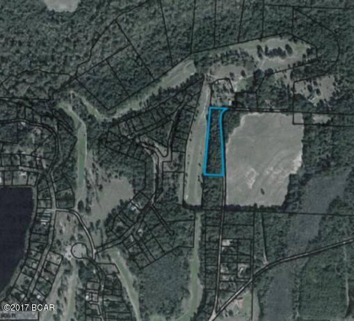 Golf Course Frontage and 3.45 acres at Dogwood Acres.  Beautiful large trees.