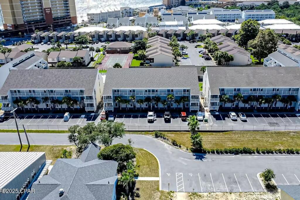 Experience coastal living at its best in this spotless second-floor condo at Endless Summer! Ideally located directly across from Beach Access 70, this beautifully furnished retreat overlooks the pools and hot tub. Move-in or rent out immediately—everything is ready to go! Featuring a queen bedroom plus a queen sleeper sofa, this unit has been freshly updated with new paint, flooring, and furniture. Enjoy amazing amenities, including two pools, a hot tub, and a clubhouse—all just minutes from Pier Park. Don't miss your chance to own a piece of​​‌​​​​‌​‌​​​​‌​​‌​​​​‌‌ paradise!
