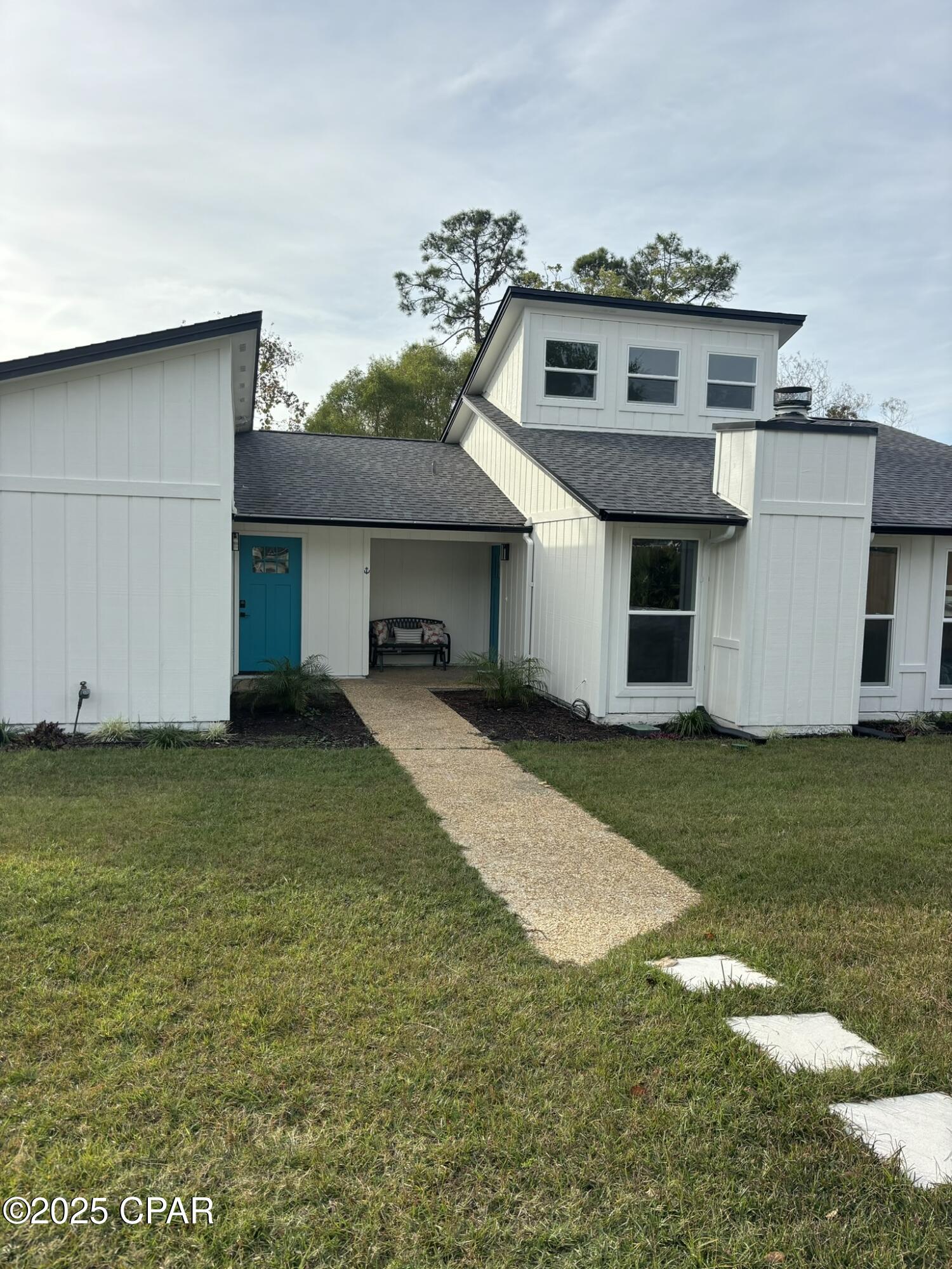 A MUST SEE! You'll love this freshly remodeled 2-bedroom, 1-bathroom duplex located right off N Lagoon. Featuring gorgeous modern upgrades, an electric fireplace, and easy access to everything PCB has to offer. Water included. Rent partially furnished or unfurnished. Non-warrantied washer and dryer are included.  Schedule your tour TODAY, this one will go fast!