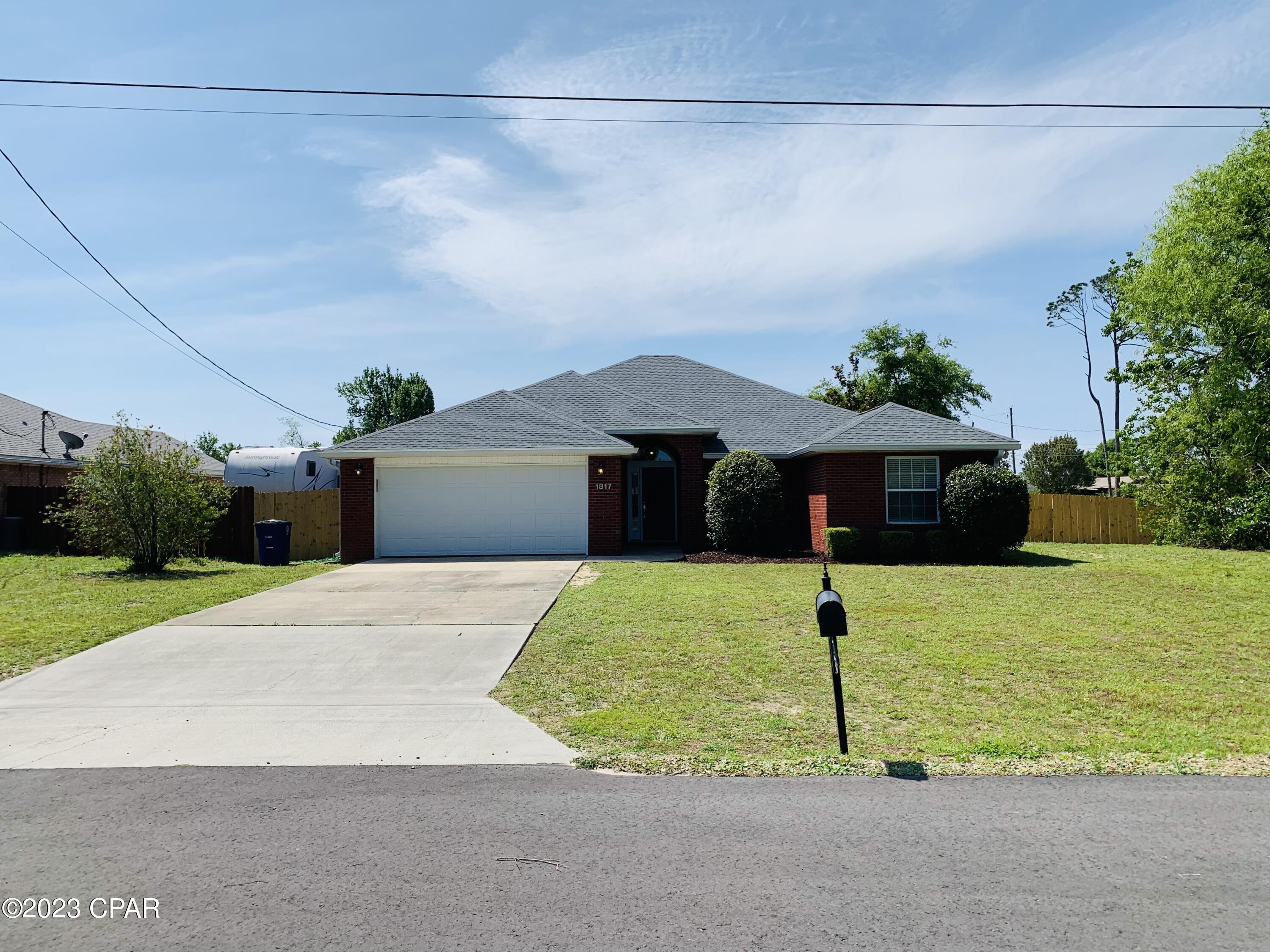 CURRENTLY UNDER CONTRACT, SELLER WILL CONSIDER BACKUP OFFERS.  Beautiful and well cared for all brick home featuring 4 bedrooms and 2 baths centrally located in Panama City.  This home is in the heart of town and is very close to shopping, restaurants and hospital. The home has plenty of living space, and features an open split floor plan, high ceilings with crown molding, hardwood floors in living room, tile in dining room/kitchen and new carpet in bedrooms.  You will love the foyer entry way along with the enclosed Florida room which is great for a nice sitting area or exercise room.  The open and updated kitchen features granite counter tops, breakfast bar, stainless appliances and double oven which is perfect for entertaining.  The spacious master bedroom has new carpet and trayed ceiling.  You will love the double vanity in the master bathroom along with the jetted tub and large separate shower.  The roof is brand new (2023) along with new privacy fence (2023), new a/c (2021) and new deck & patio (2021.)  The home sits on a large lot at the end of the street so there is no through traffic.  The back yard has a privacy fence, nice wood deck and paver area for lawn chairs and firepit area.  So if you are looking for a home that is not on top of your neighbors, has a little space, close to shopping, and is a quick drive over to the beach, you just found it!