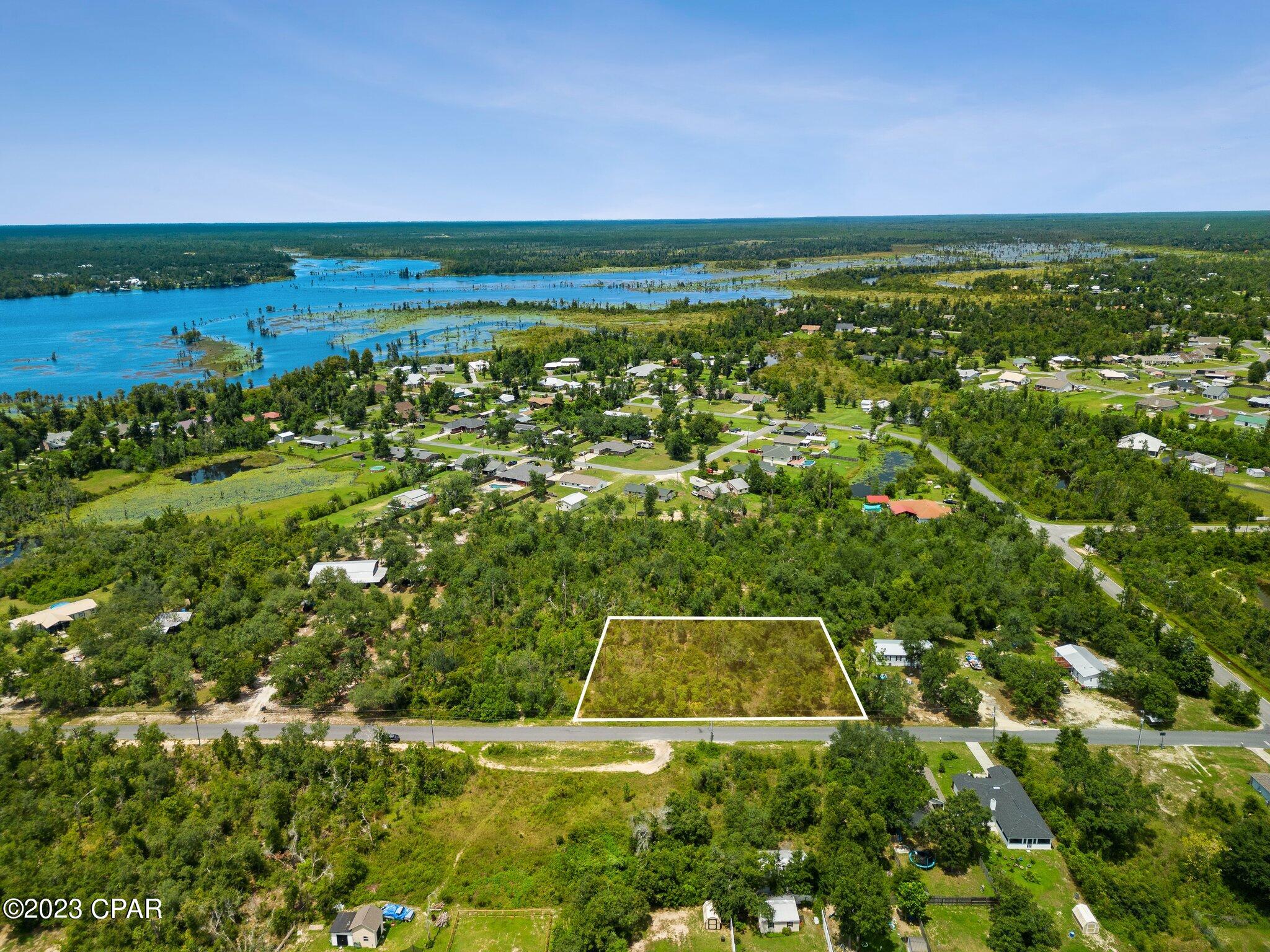 Discover the perfect opportunity to bring your vision to life on 00 Palm Ave, located in the serene heart of Bayou George, Youngstown, FL. This exceptional piece of land offers you the chance to design and construct your dream retreat exactly the way you envision it.

Property Highlights:
Water Lover's Paradise: Imagine living just a stone's throw away from the beautiful Deerpoint Lake. Fishing, boating, and water adventures are all at your doorstep.
Flood Zone X: Relax knowing your future oasis is situated in a minimal flood risk area, providing peace of mind during rainy seasons.
No HOA Restrictions: Enjoy the freedom to bring your creative dreams to life without the constraints of an HOA.
Amenities to Delight:
Boat Enthusiast's Dream: Public boat ramps nearby mean easy access to the lake's tranquility and excitement whenever you desire.
Nature's Haven: Surround yourself with the beauty of nature and relish in the peaceful atmosphere of the Bayou George area.
Convenience in Proximity: Everyday conveniences, shopping, and dining options are just a short drive away, offering the perfect balance between seclusion and modern amenities.

Your Opportunity is Here:
With 00 Palm Ave, you're not just purchasing land; you're investing in your future sanctuary. Build the home you've always dreamed of in a location that's tailor-made for a life of relaxation and recreation.

Act Now:
Opportunities like this don't come around often. Contact us today to seize this chance and turn 00 Palm Ave into the foundation of your ideal Bayou George lifestyle.