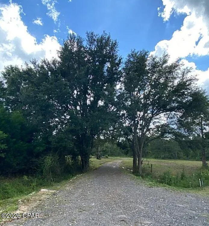 2-acre vacant lot in Bonifay with electric and water already in place. Located at 3022 Sandpath Rd, this property is ready for your homesite, mobile home, or investment use. Includes a 10x12 shed for storage and two sides of the property fenced by neighboring parcels. Level and usable land with plenty of space for building, gardening, or recreation. Enjoy a quiet rural setting with convenient access to town. Great opportunity for a ready-to-build parcel in Holmes County.