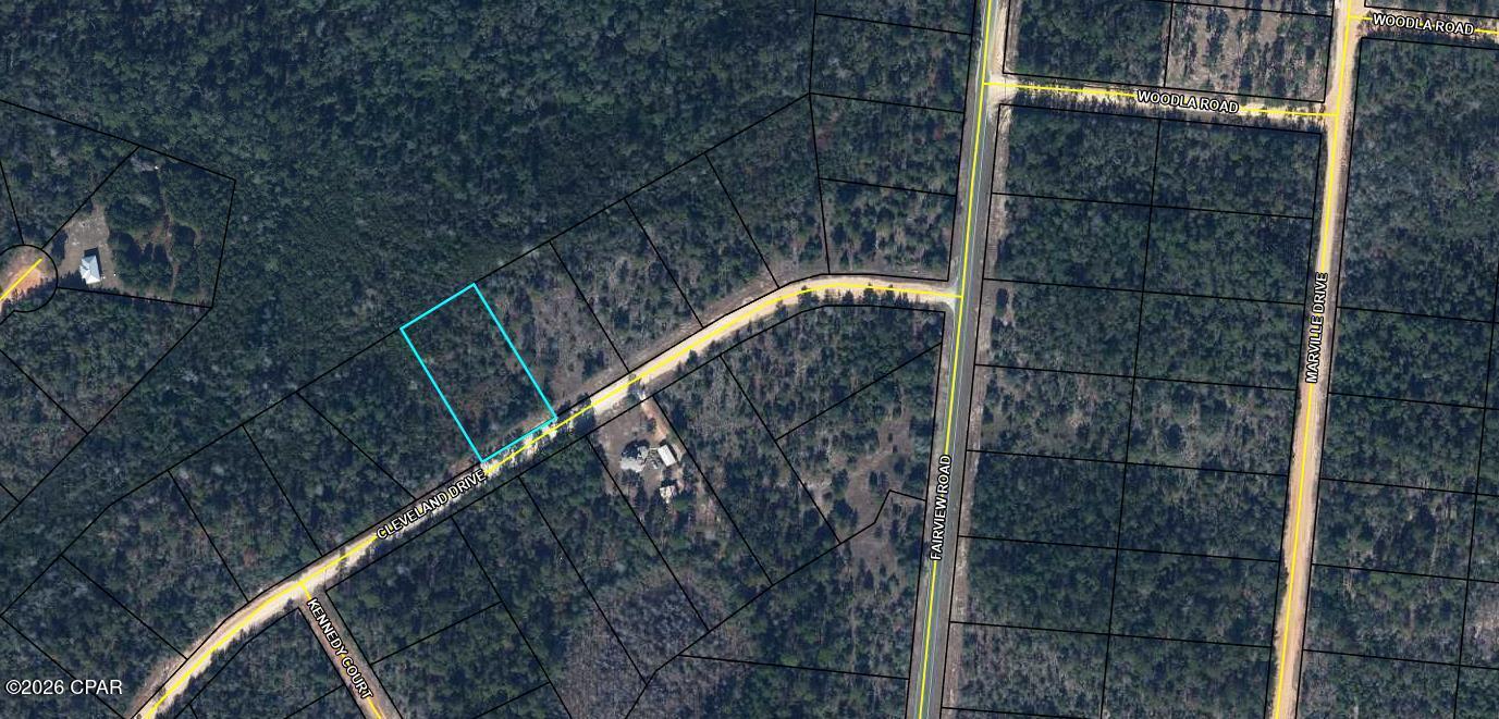 Beautiful lot to either build your dream home or place your new manufactured home in the unique community of Compass Lake in the Hills.  No mandatory HOA but if you choose to be a member you will have access to all the amenities that the association offers. These include swimming pool, tennis courts, cabin rentals, RV spaces, and more. Quiet, peaceful country living, yet still a reasonable commute to Panama City and all that is offered there. All measurements are estimates to be verified by buyer.